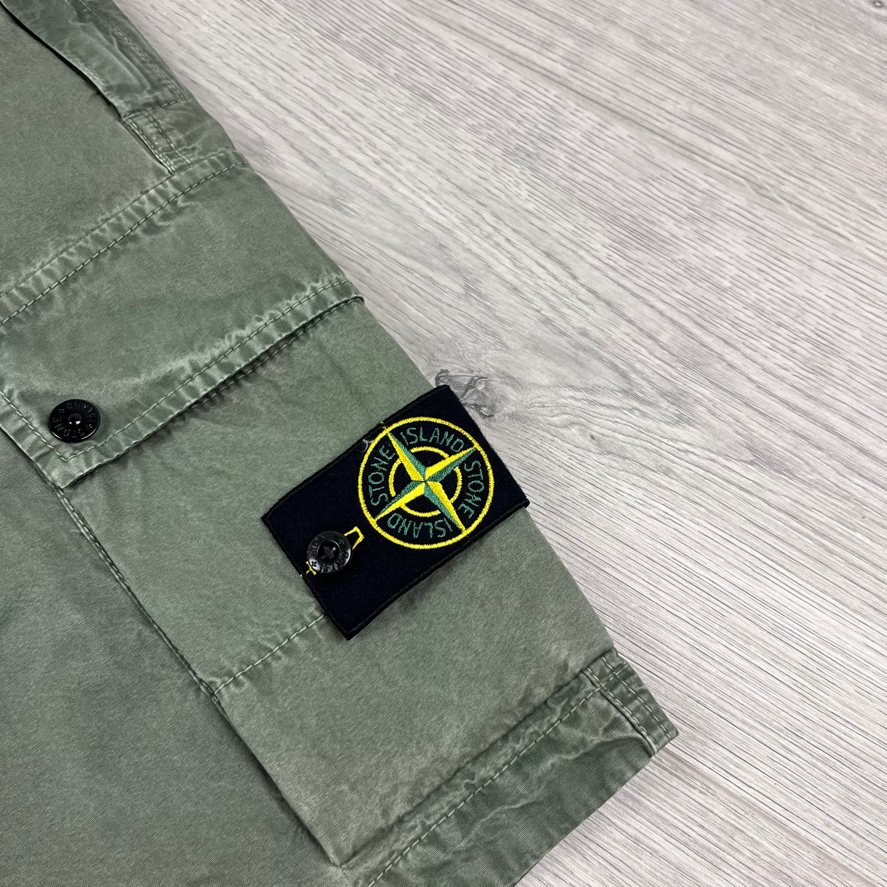 Stone Island Bermuda Cargo Shorts in Musk Green. On sale at Open Attire.