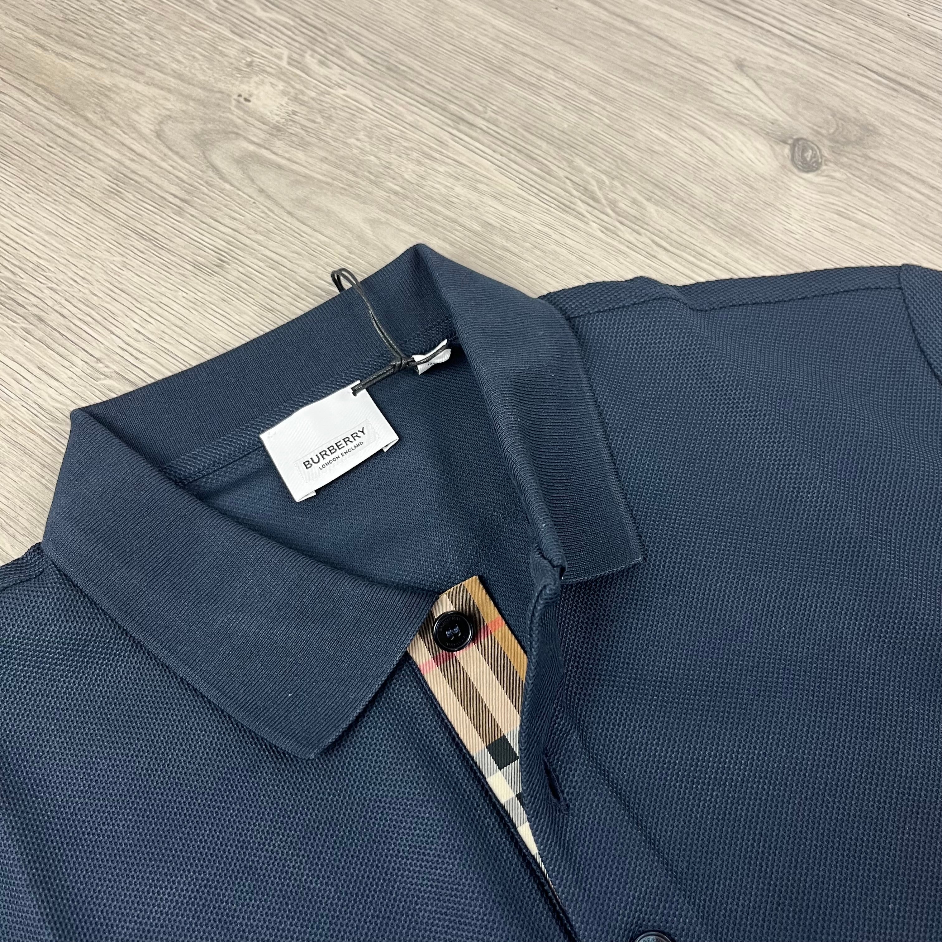 Burberry 'Hartford' Polo Shirt in Navy Blue. On sale at Open Attire.