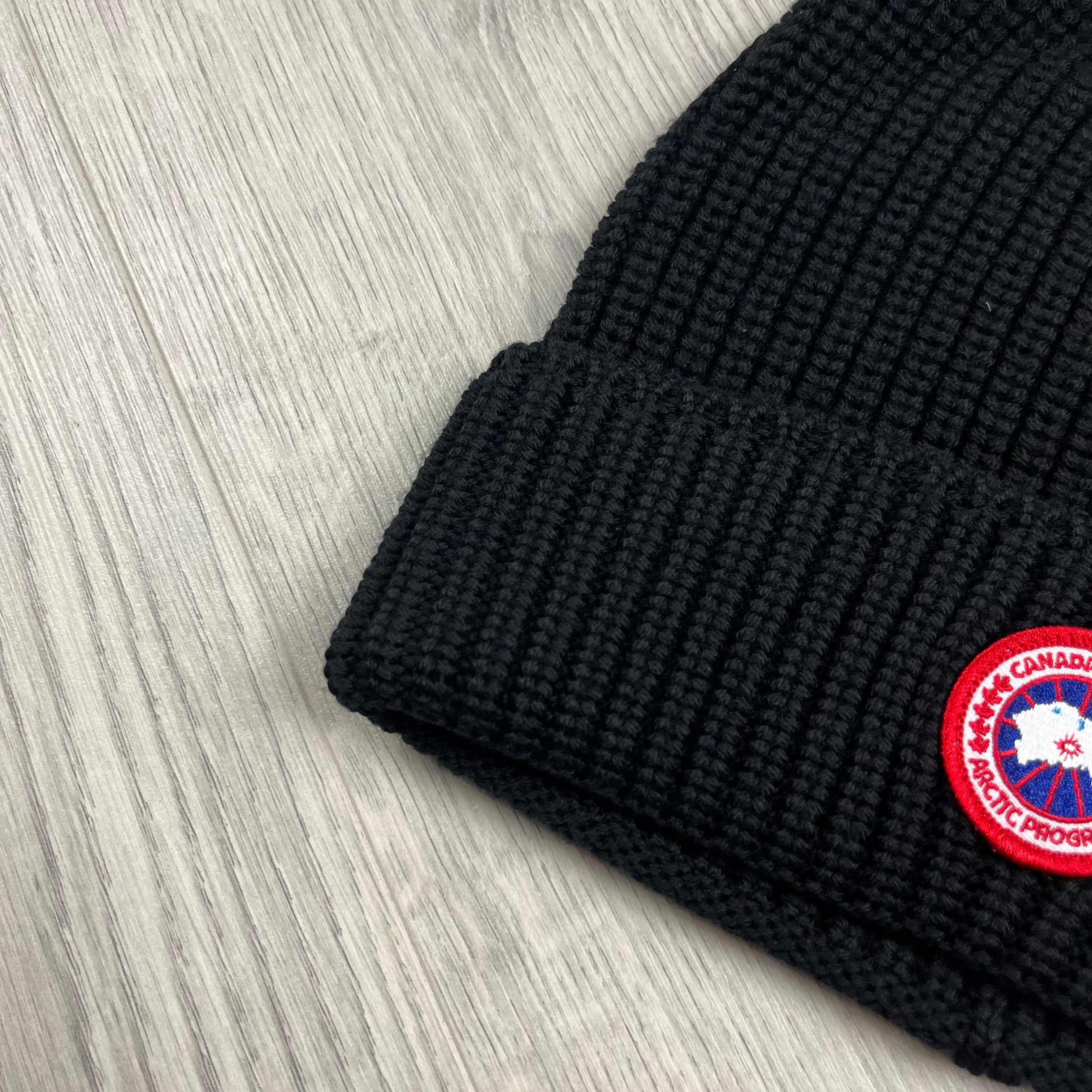 Canada Goose Ribbed Toque Beanie in Black. On sale at Open Attire.
