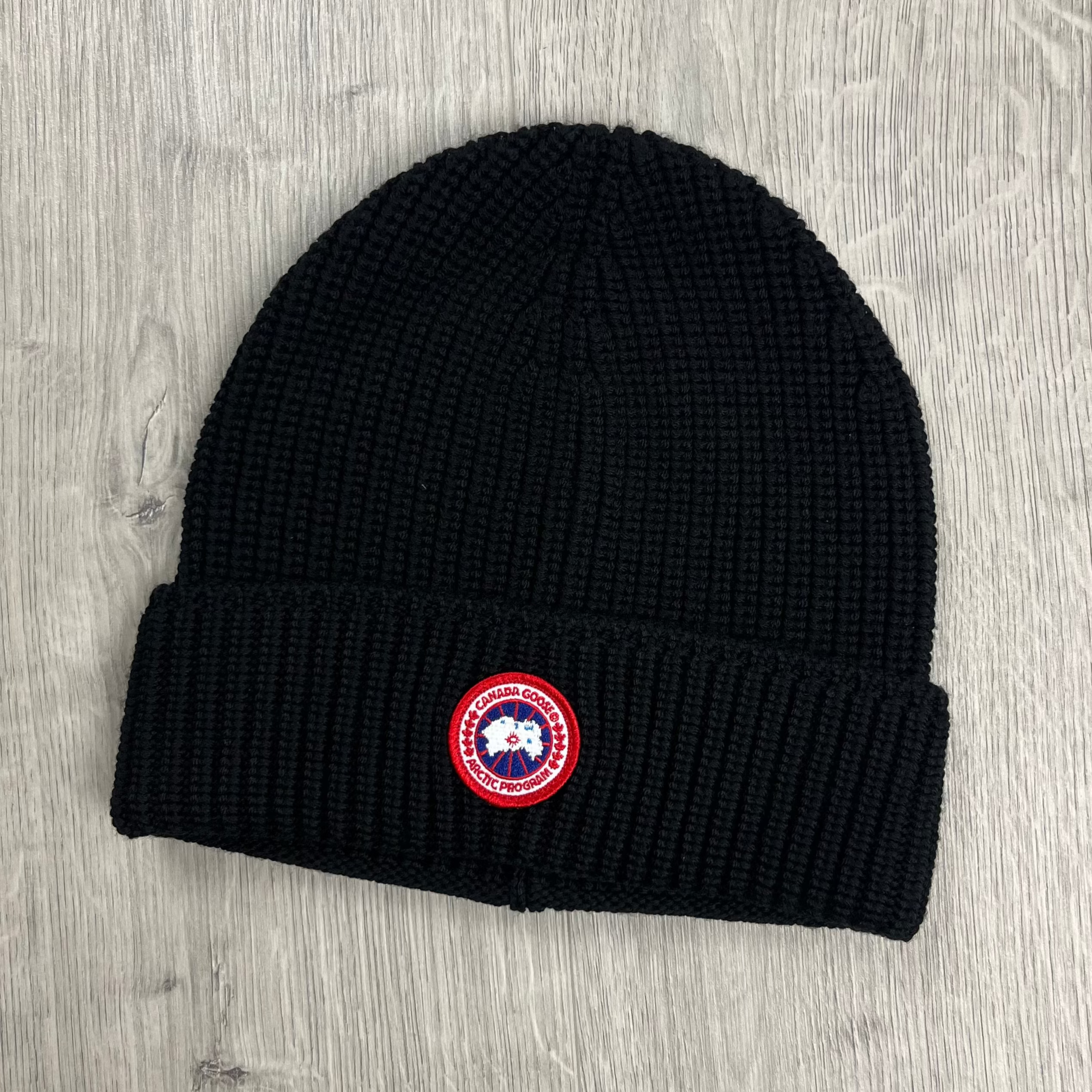 Canada Goose Ribbed Toque Beanie in Black. On sale at Open Attire.