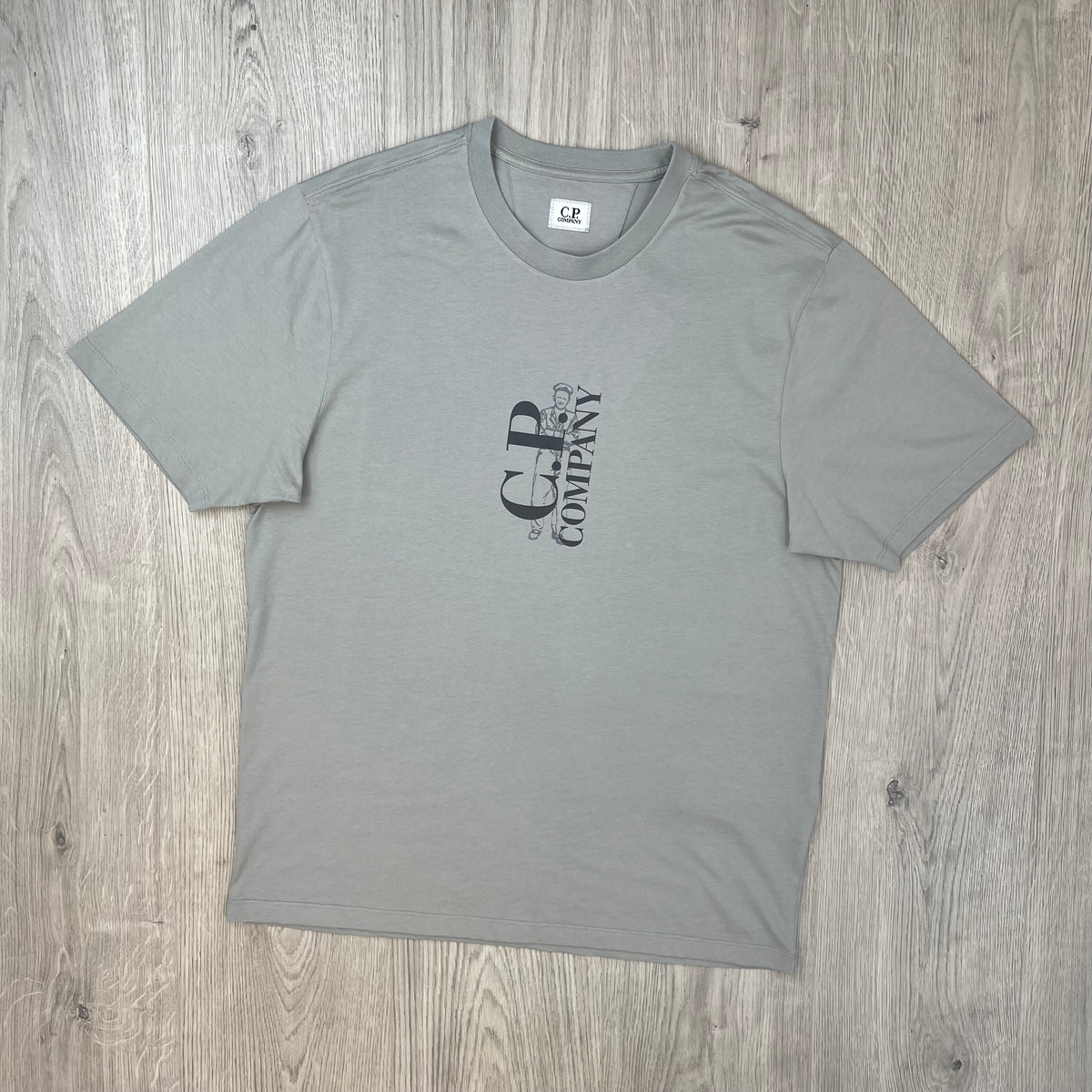 Front view of a CP Company 30/1 Sailor T-Shirt in Flint Grey.