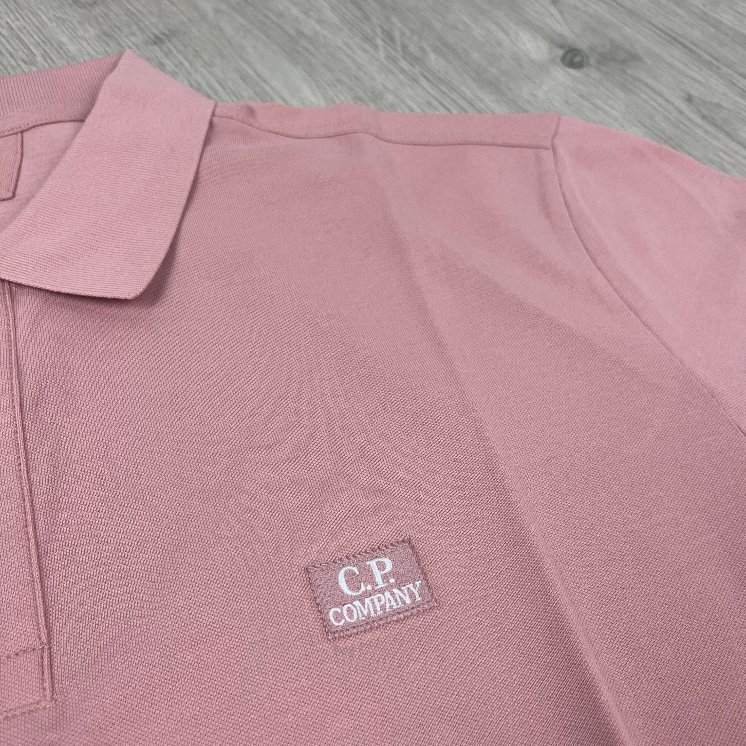 CP Company Piquet Polo Shirt in Misty Rose. On sale at Open Attire.