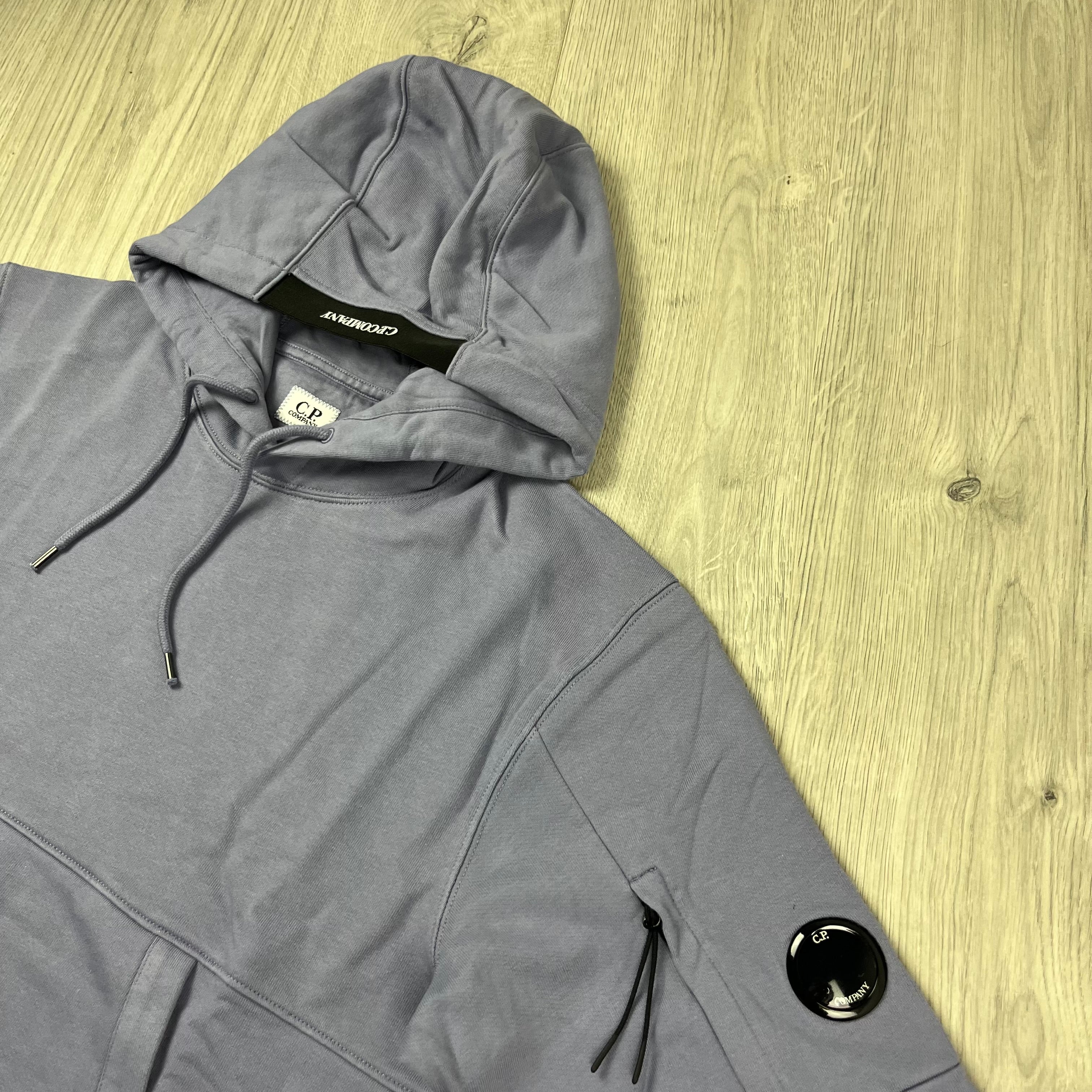 CP Company Diagonal Raised Fleece Hoodie in Lavender Violet. On sale at Open Attire.