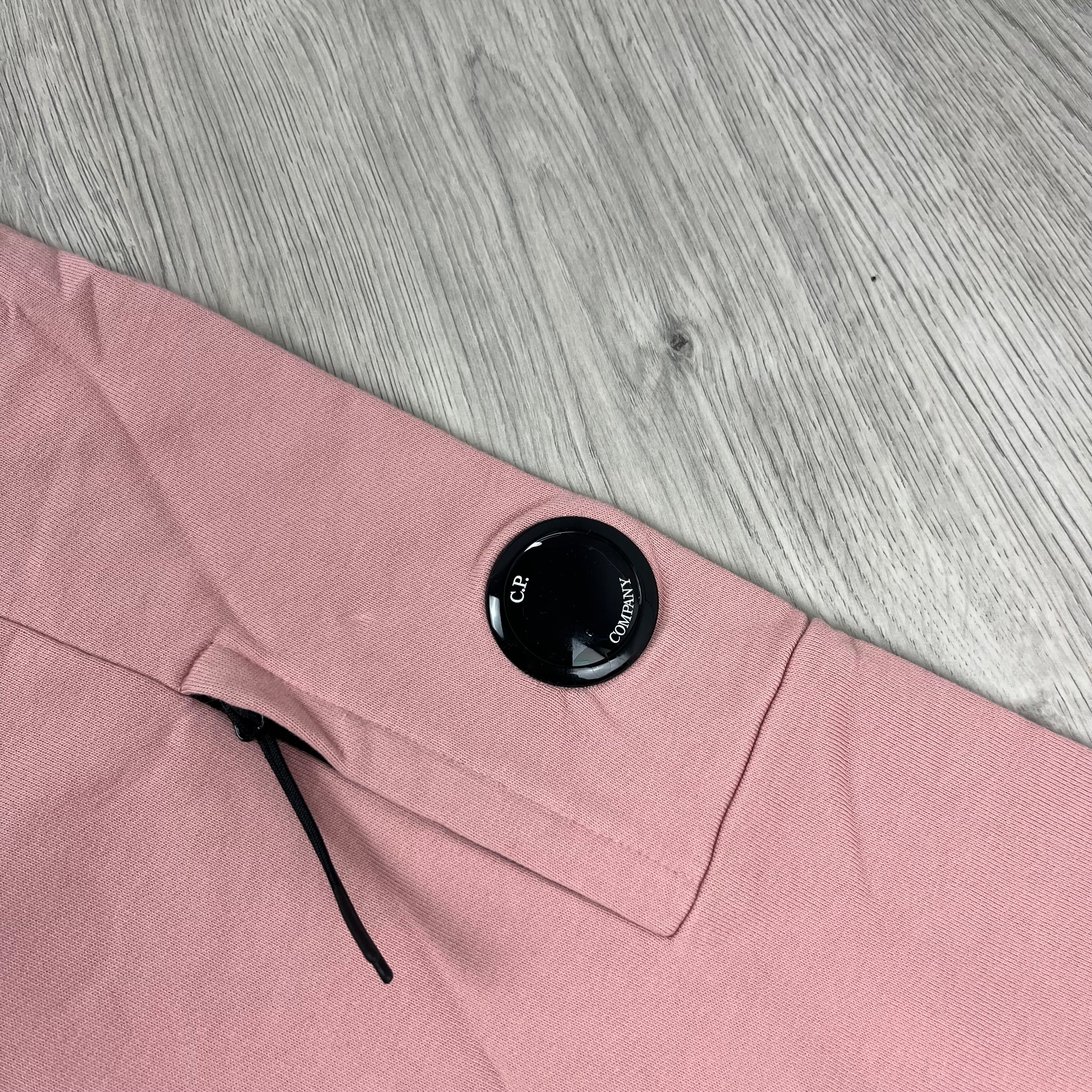 CP Company Diagonal Raised Fleece Hoodie in Misty Rose. On sale at Open Attire.