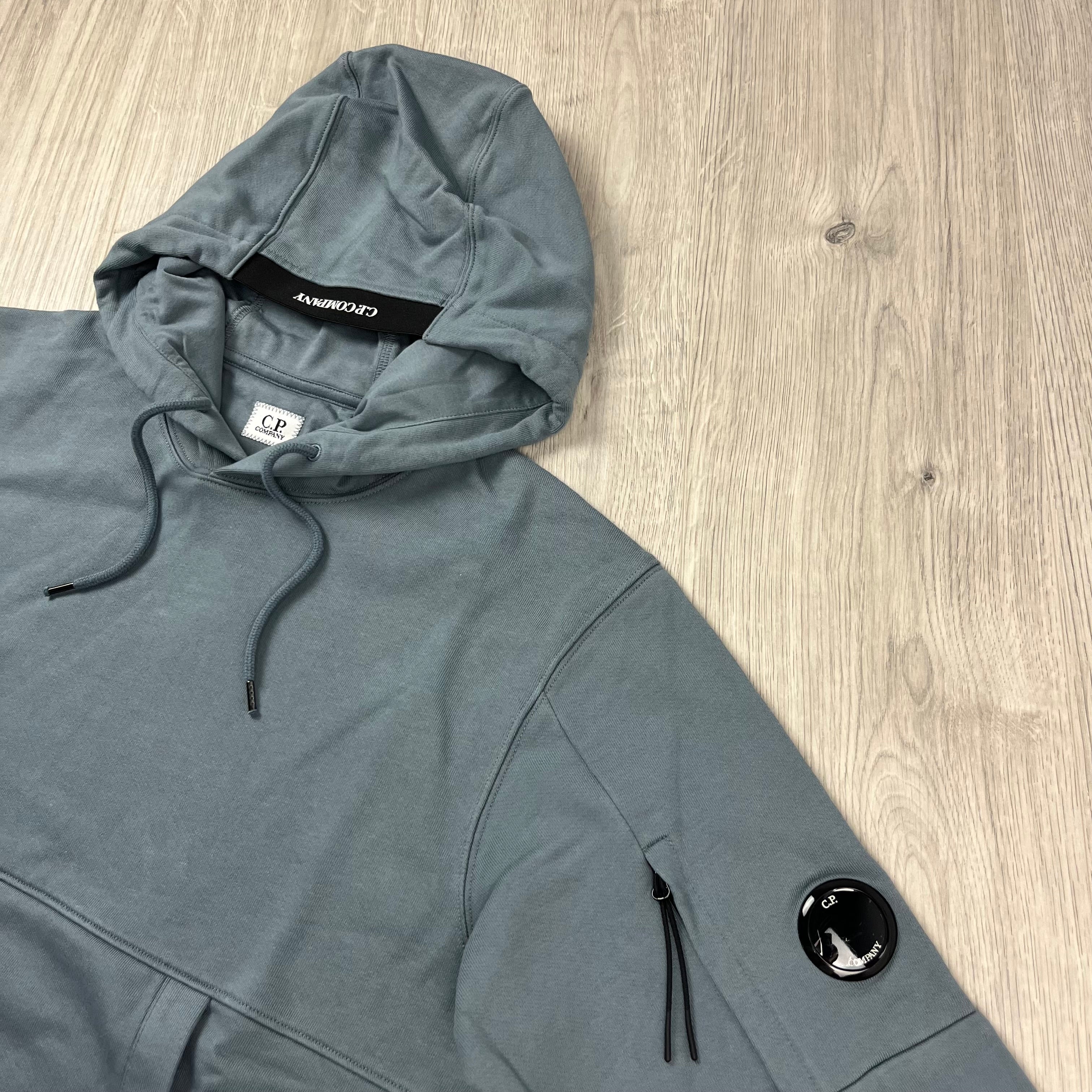 CP Company Diagonal Raised Fleece Hoodie in Stormy Weather. On sale at Open Attire.
