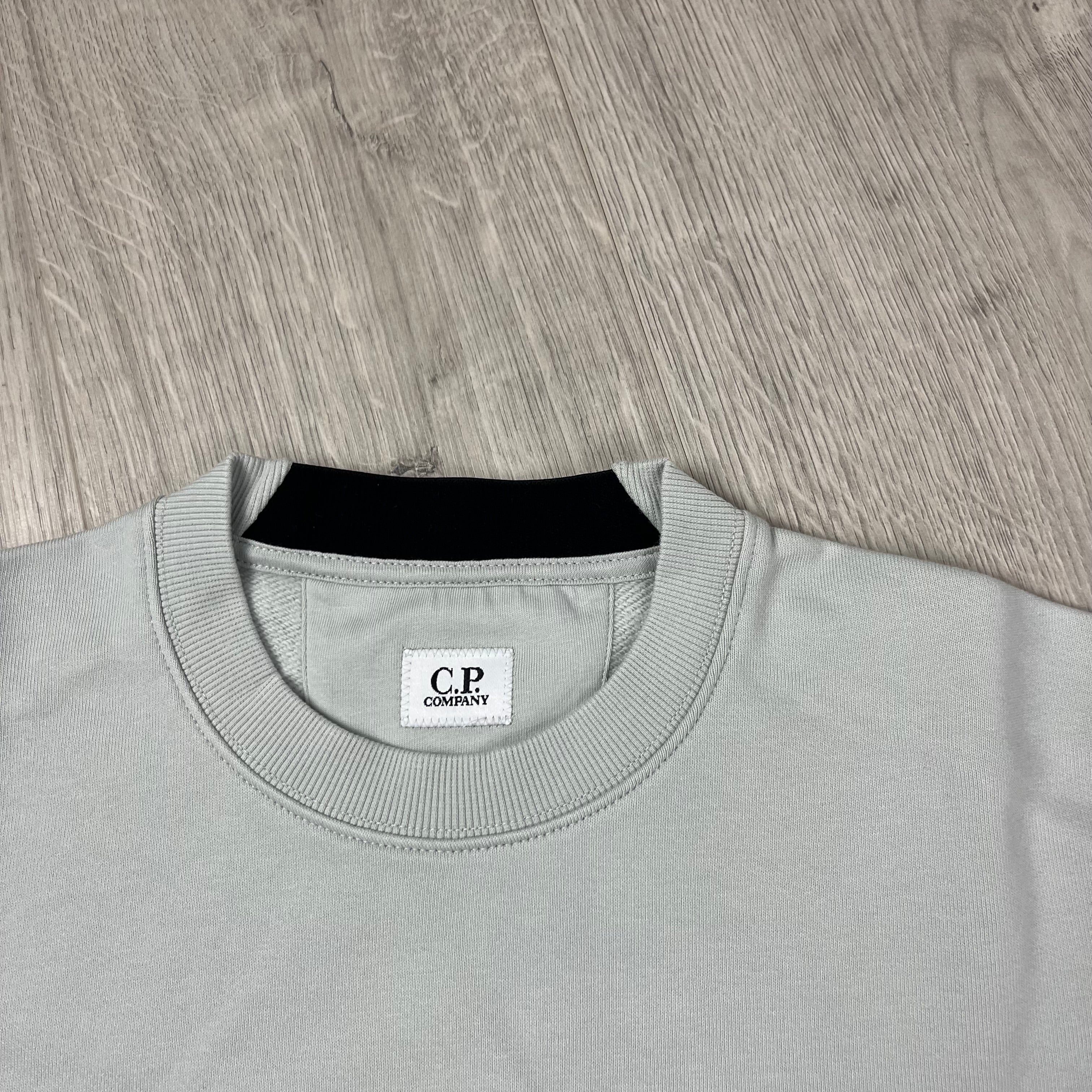 CP Company Raised Fleece Sweatshirt in Blue Fox. On sale at Open Attire.
