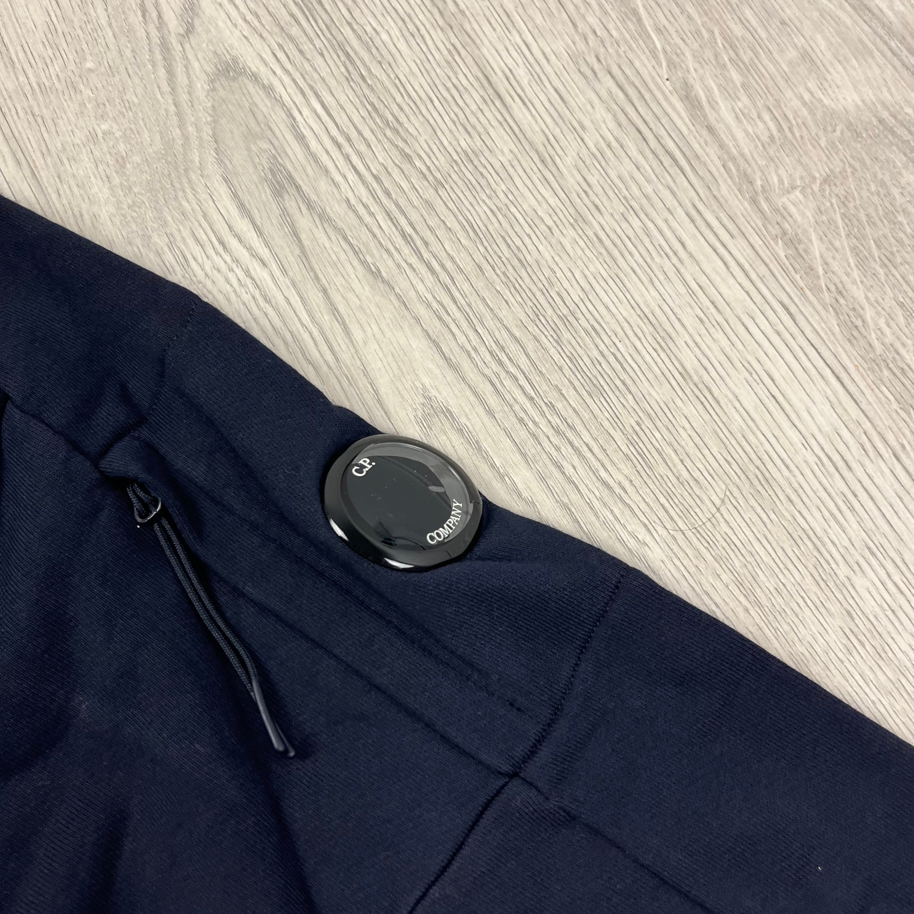 CP Company Diagonal Raised Fleece Zip Hoodie in Total Eclipse Navy Blue. On Sale at Open Attire.