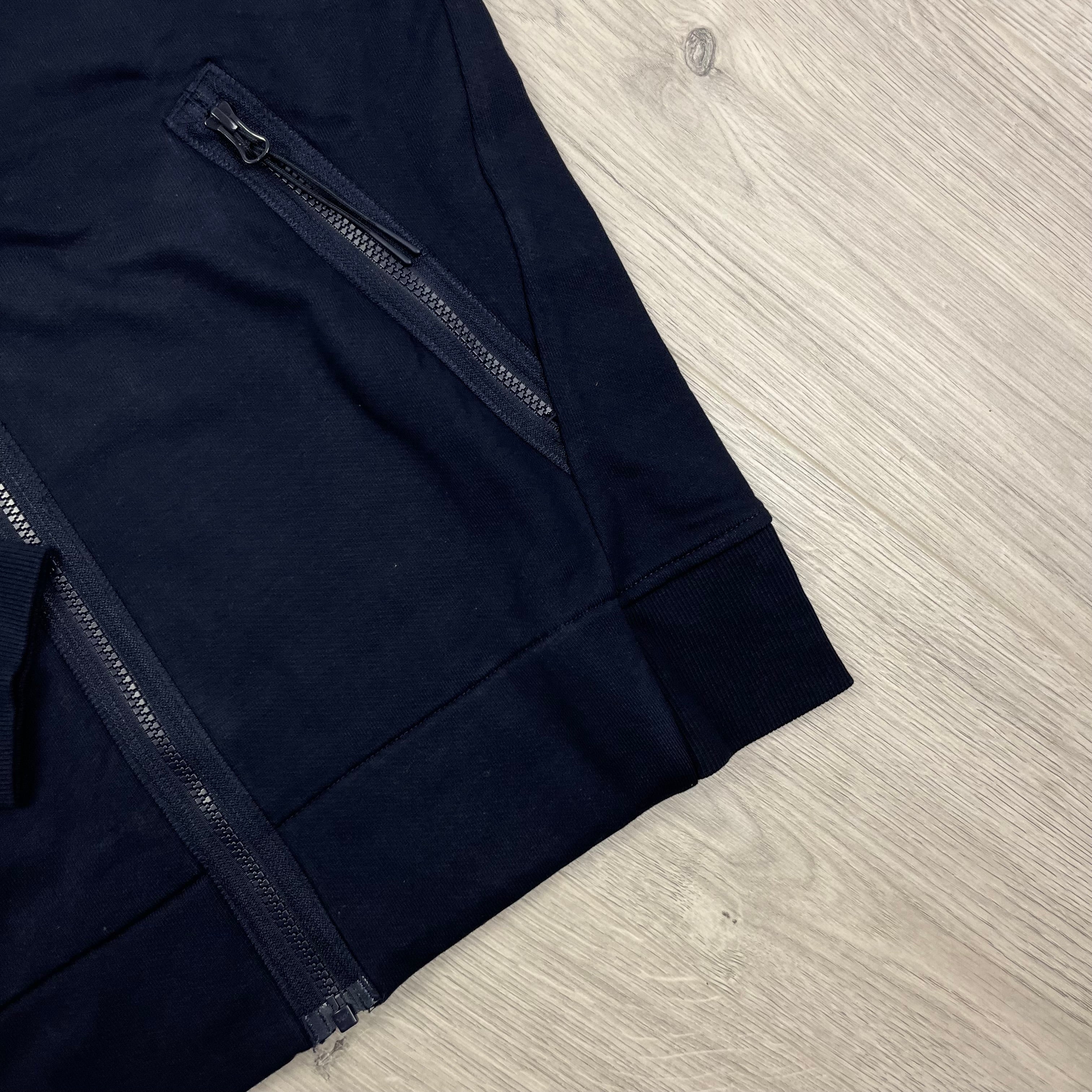 CP Company Diagonal Raised Fleece Zip Hoodie in Total Eclipse Navy Blue. On Sale at Open Attire.