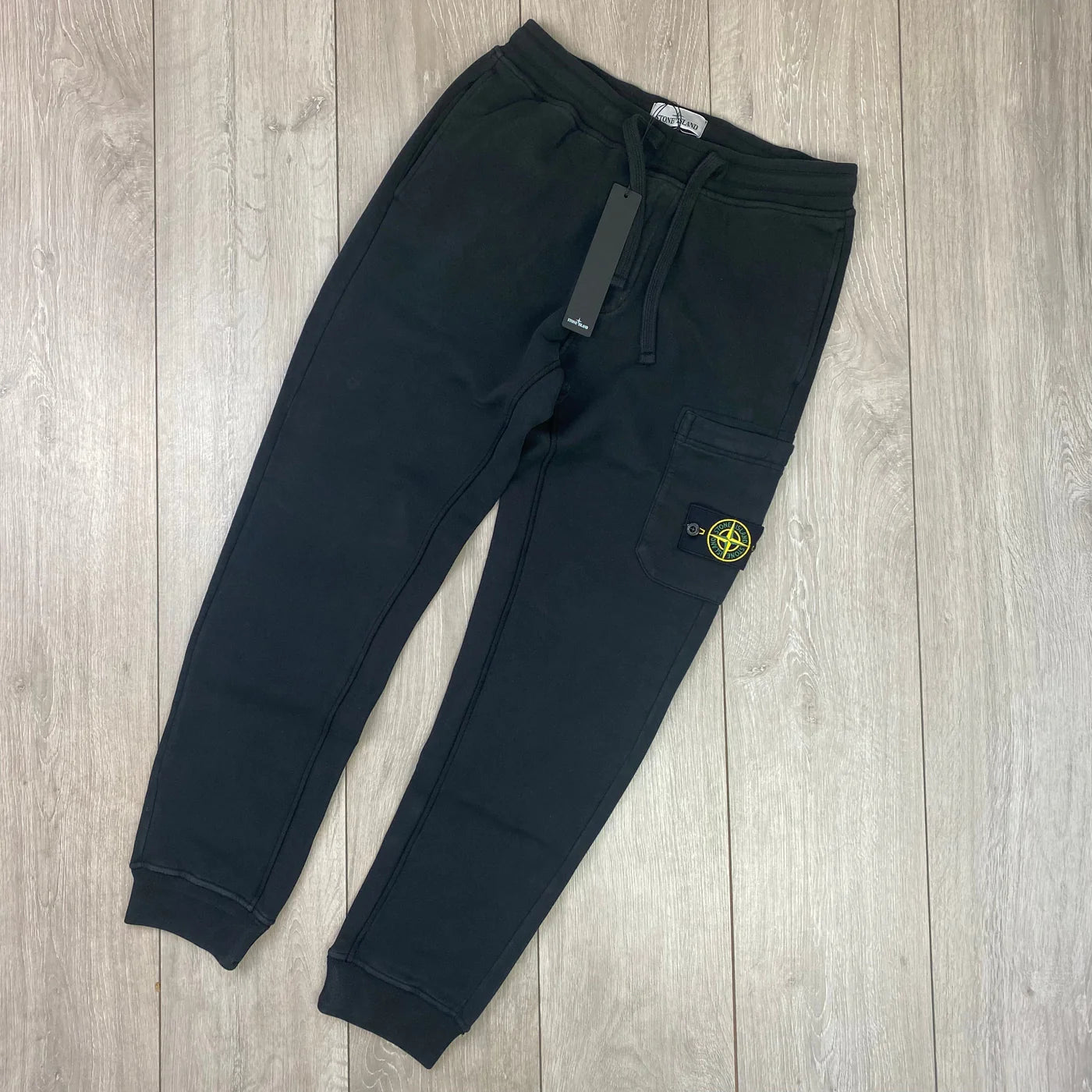 Stone Island Tracksuit Sweatpants in Black. On sale at Open Attire.
