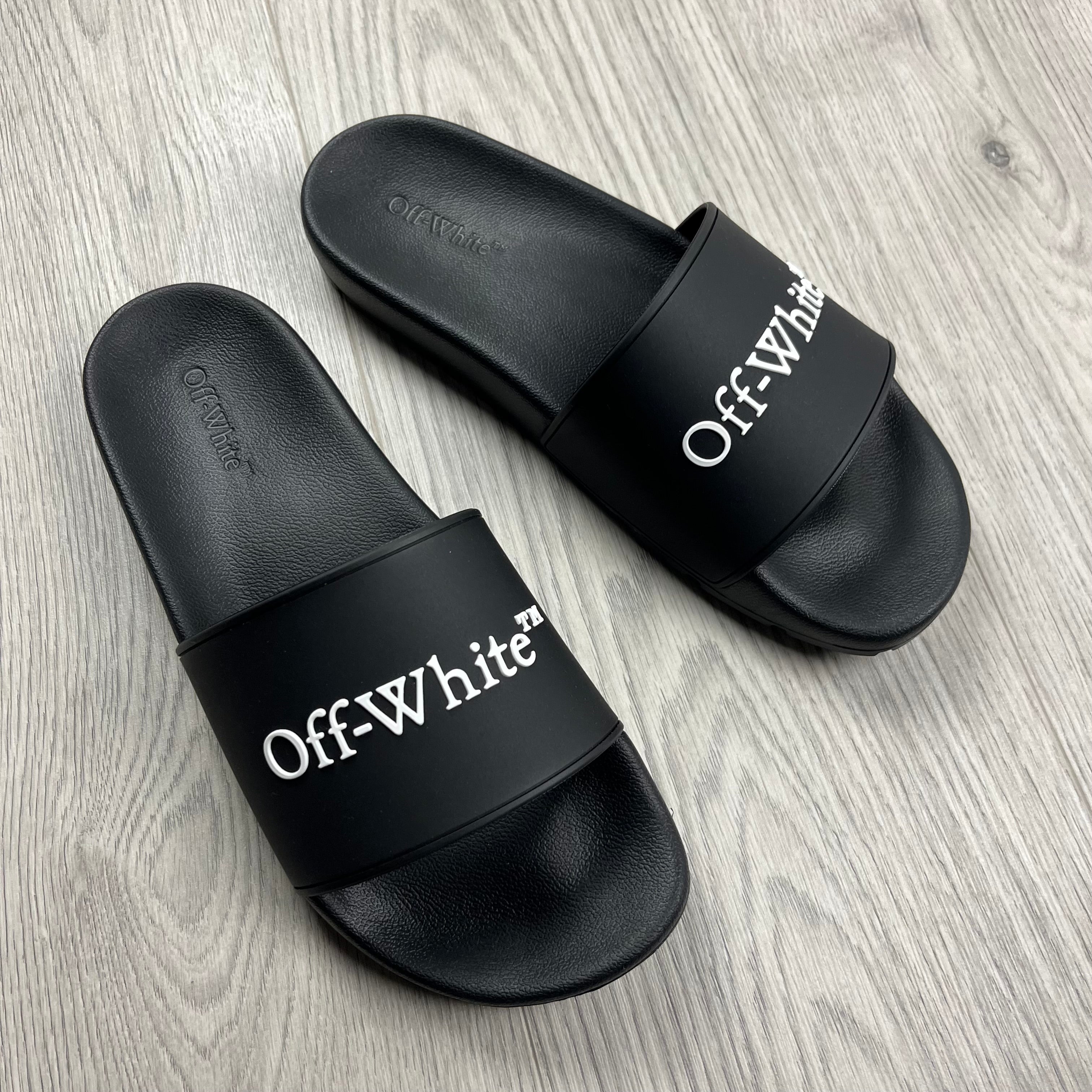 Off-White c/o Virgil Abloh Bookish Slides in Black. On sale at Open Attire.