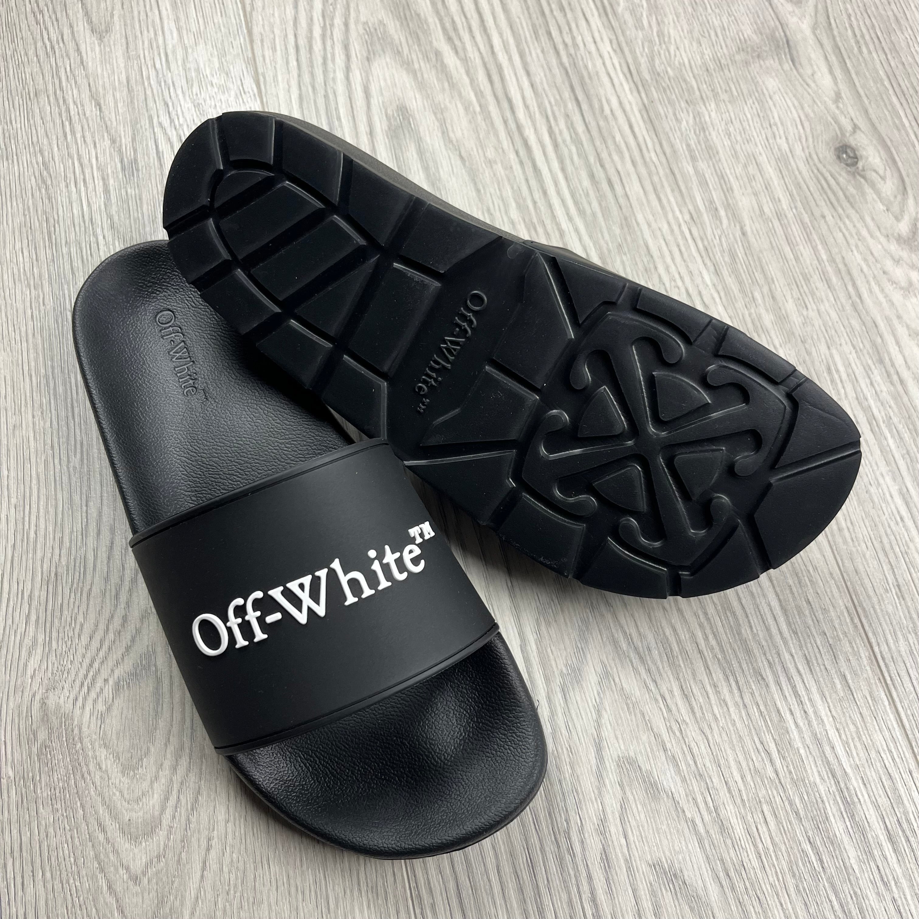 Off-White c/o Virgil Abloh Bookish Slides in Black. On sale at Open Attire.