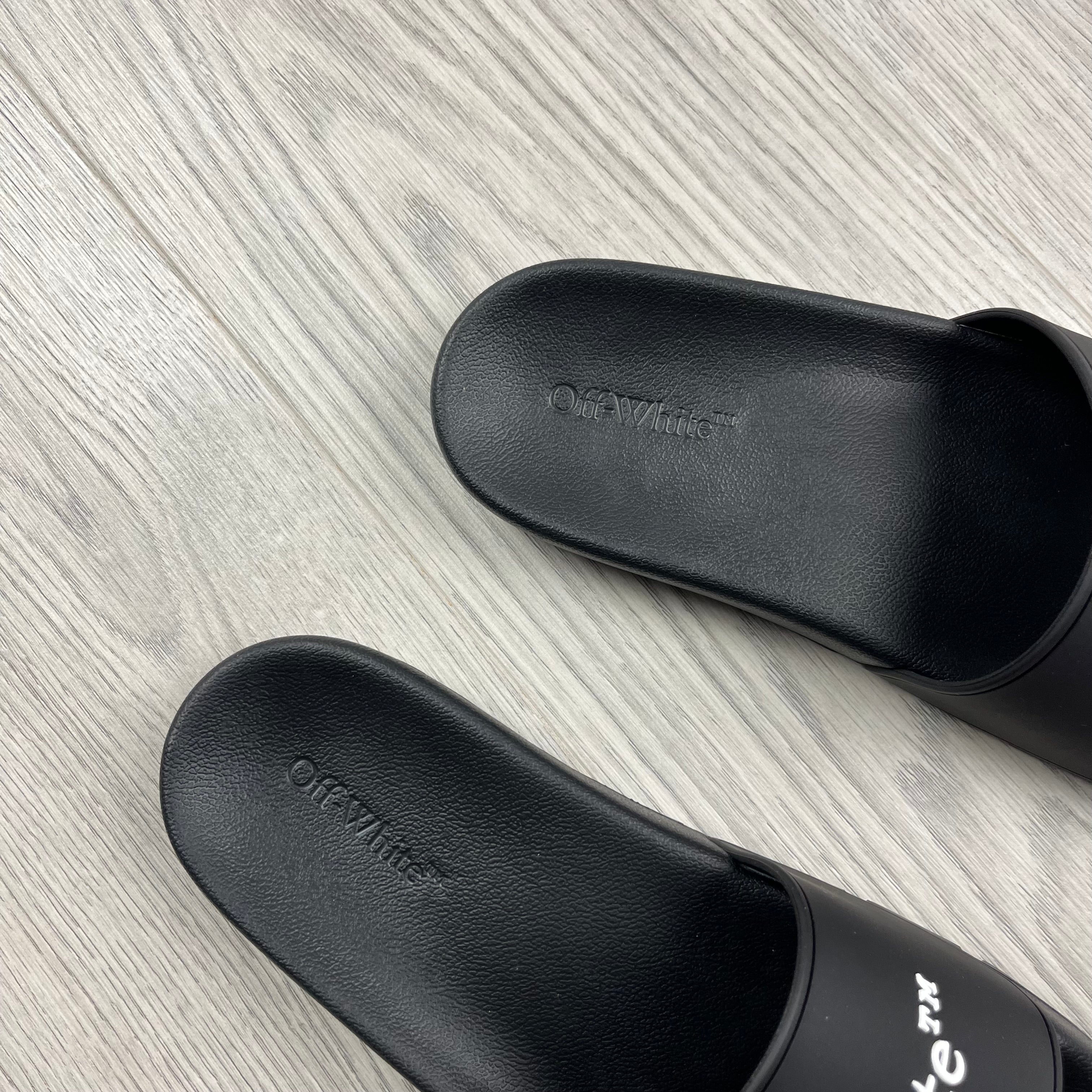 Off-White c/o Virgil Abloh Bookish Slides in Black. On sale at Open Attire.