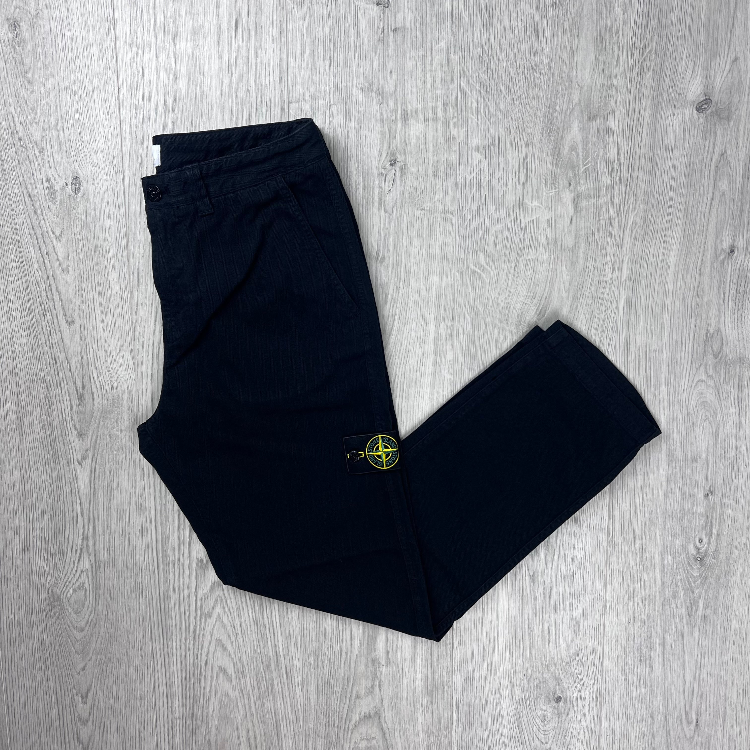 Front view of the Stone Island Cotton Herringbone Chino Trousers in Black.