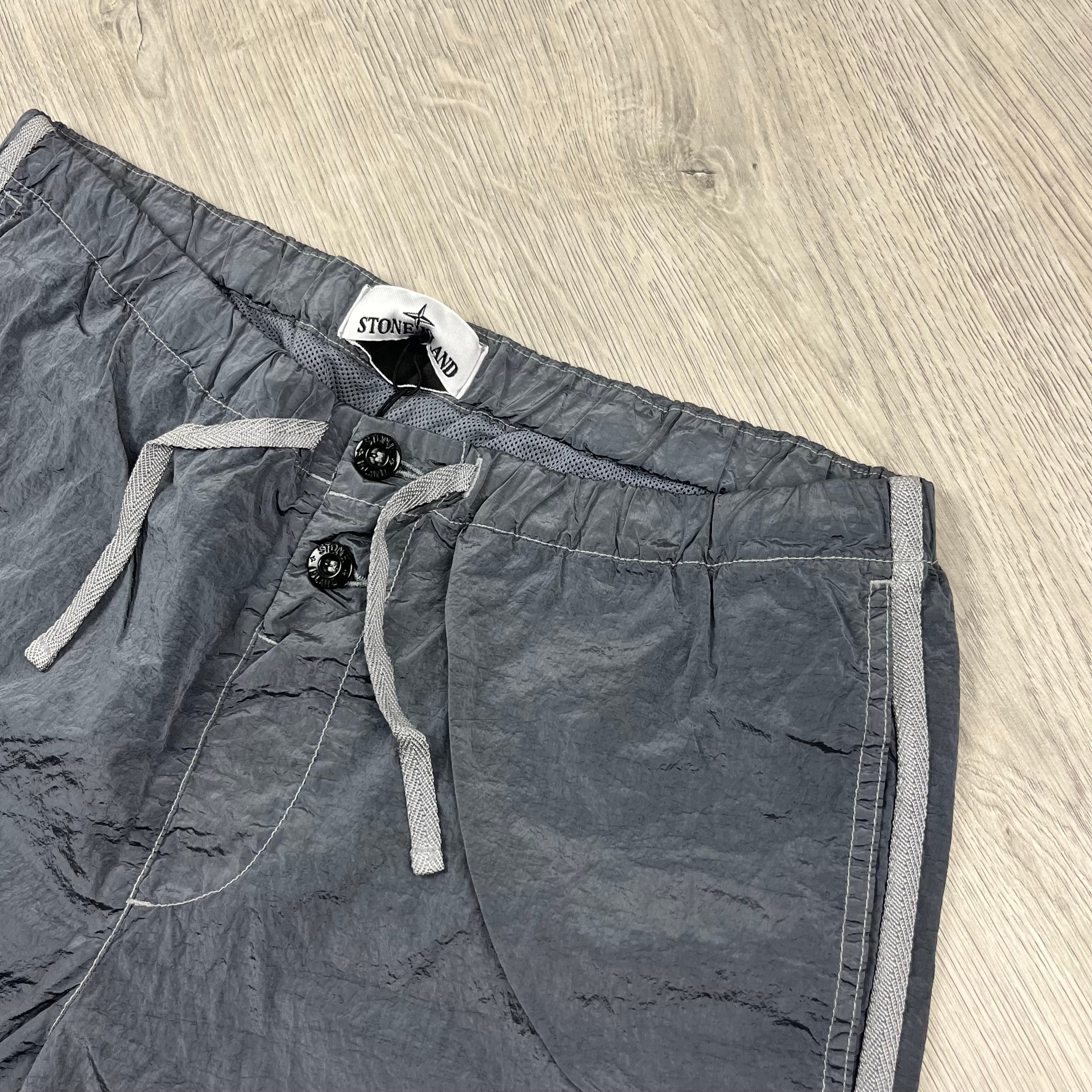 Stone Island Nylon Metal Swim Shorts in Avio Blue. On sale at Open Attire.