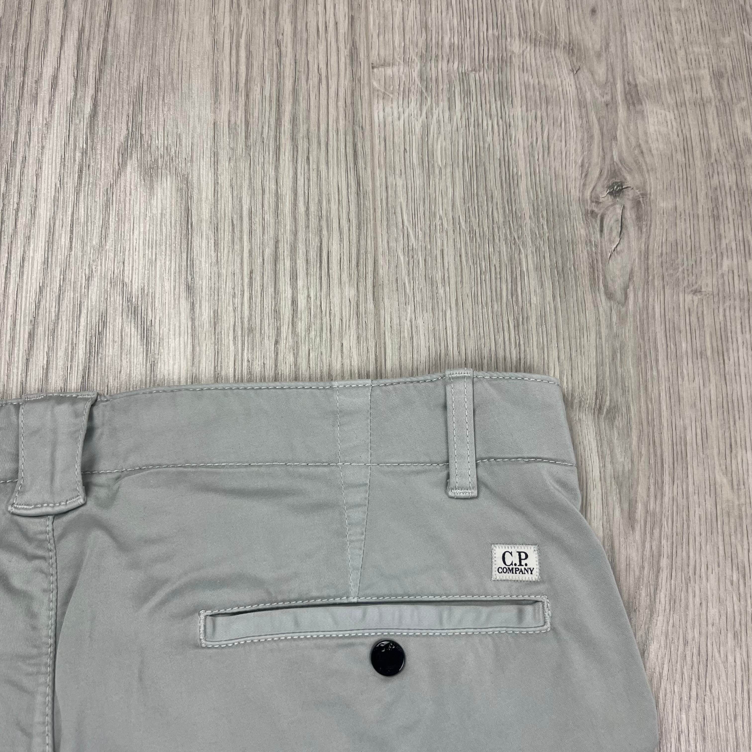 CP Company Stretch Sateen Cargo Trousers in Blue Fox. On sale at Open Attire.