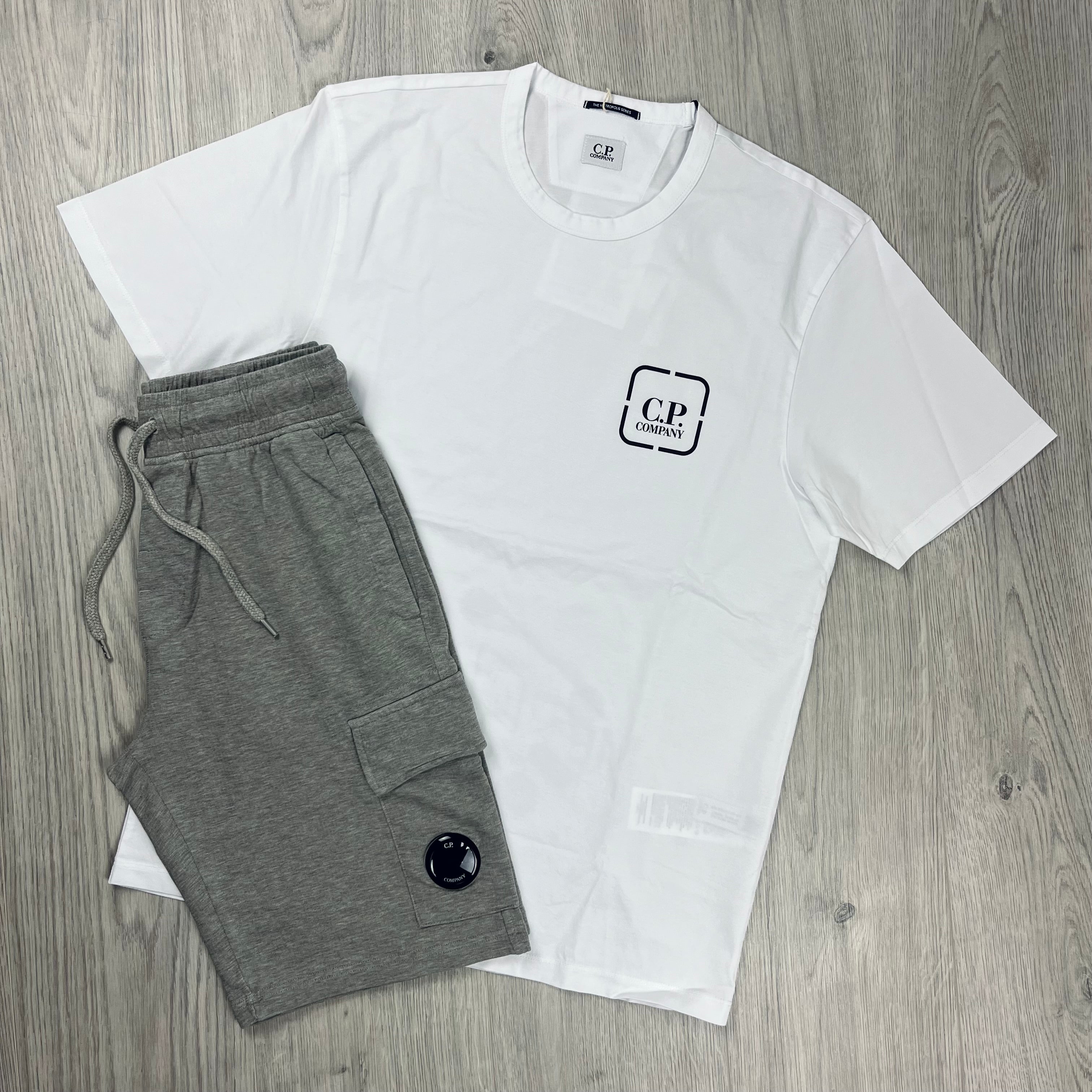 CP Company Tracksuit consisting of a Gauze White Metropolis T-shirt and Greystone Melange Jersey Shorts. On sale at Open Attire.