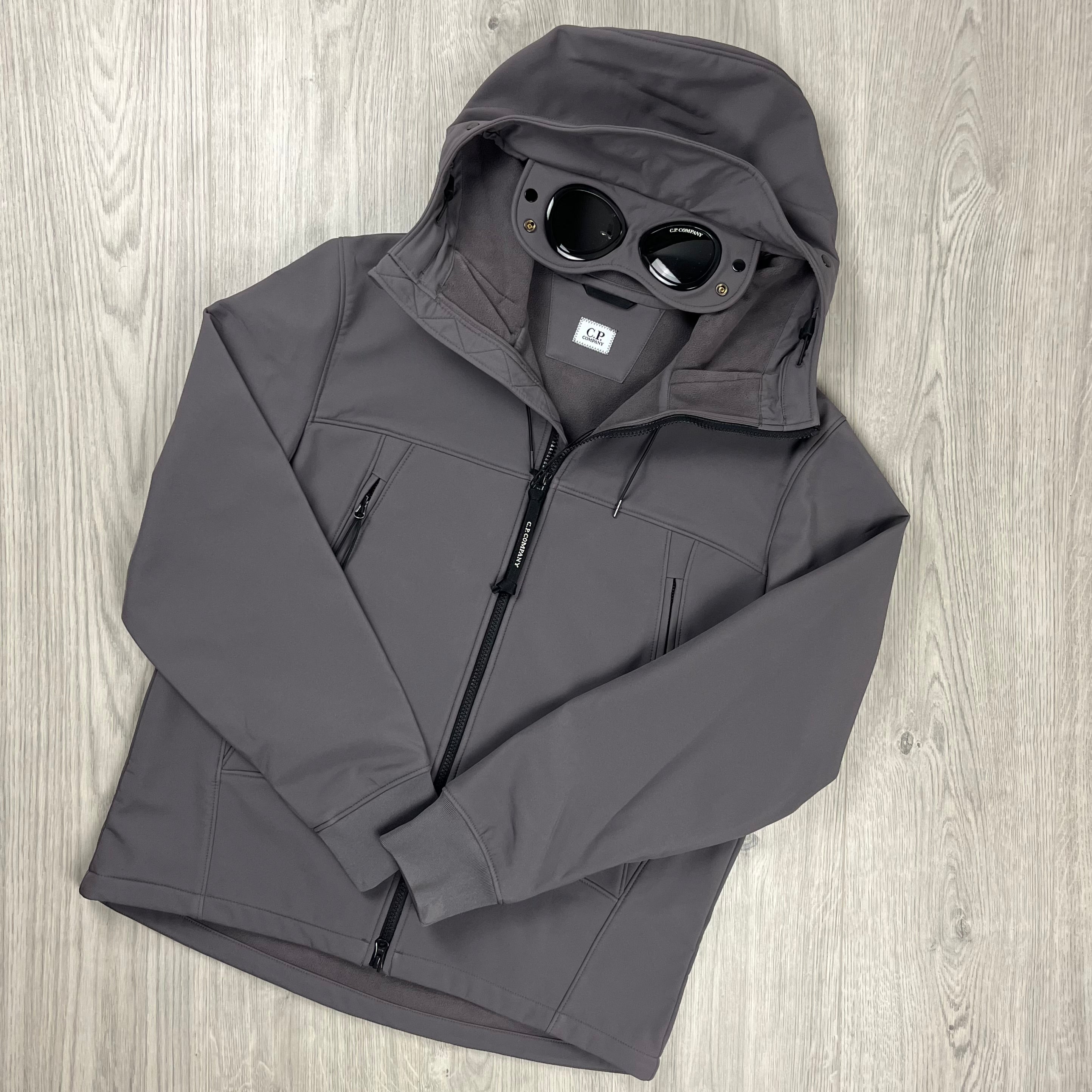 CP Company Shell-R Goggle Jacket in Boulevard Grey. On sale at Open Attire.