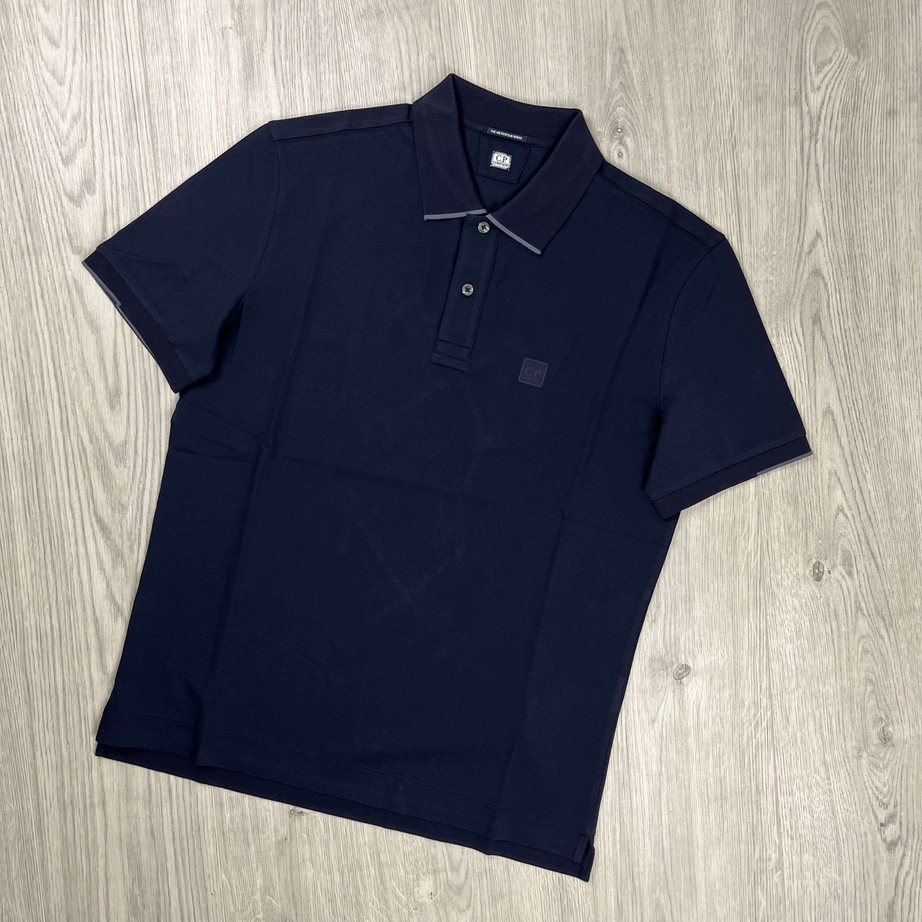 CP Company Metropolis Polo Shirt in Sky Captain. On sale at Open Attire.