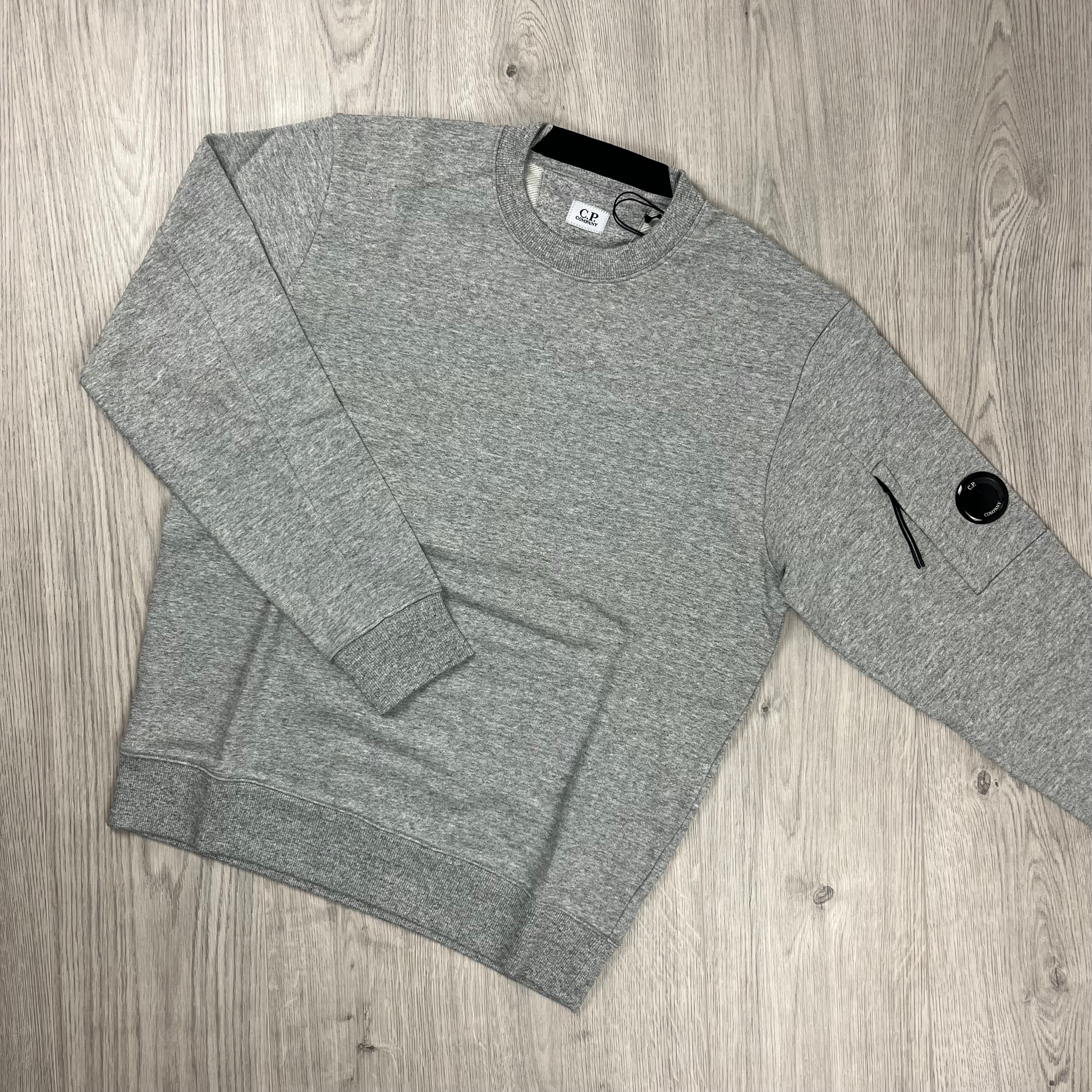 CP Company Raised Fleece Sweatshirt in Greystone Melange. On sale at Open Attire.