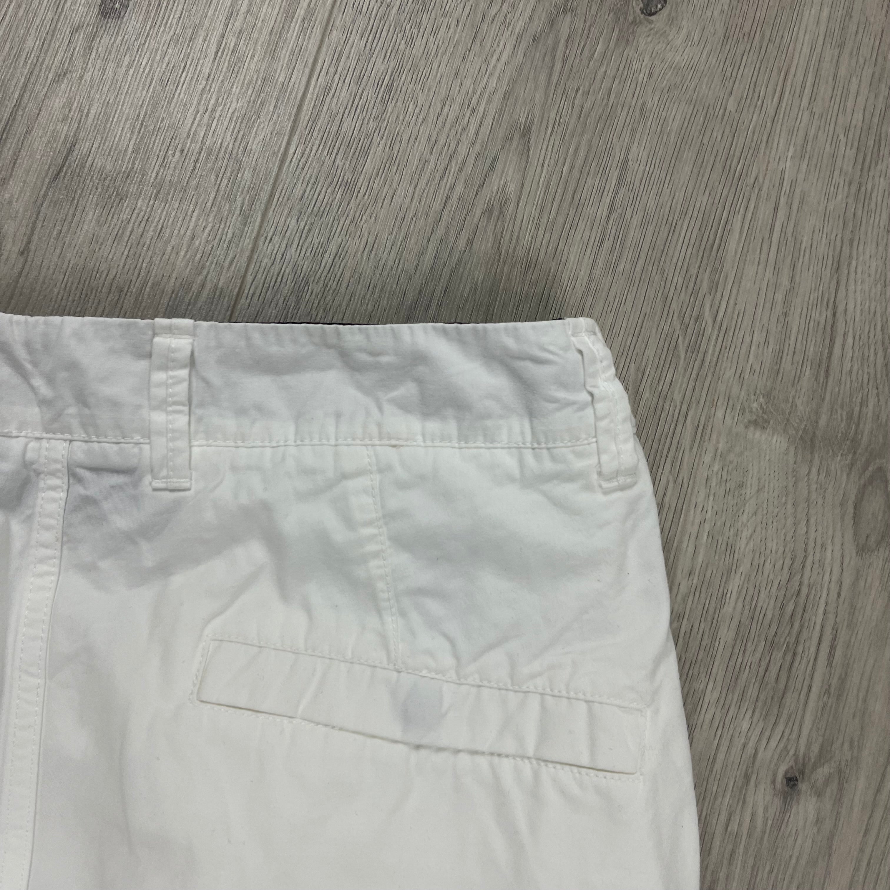 Stone Island 'OLD' treatment cargo trousers in White. On sale at Open Attire.