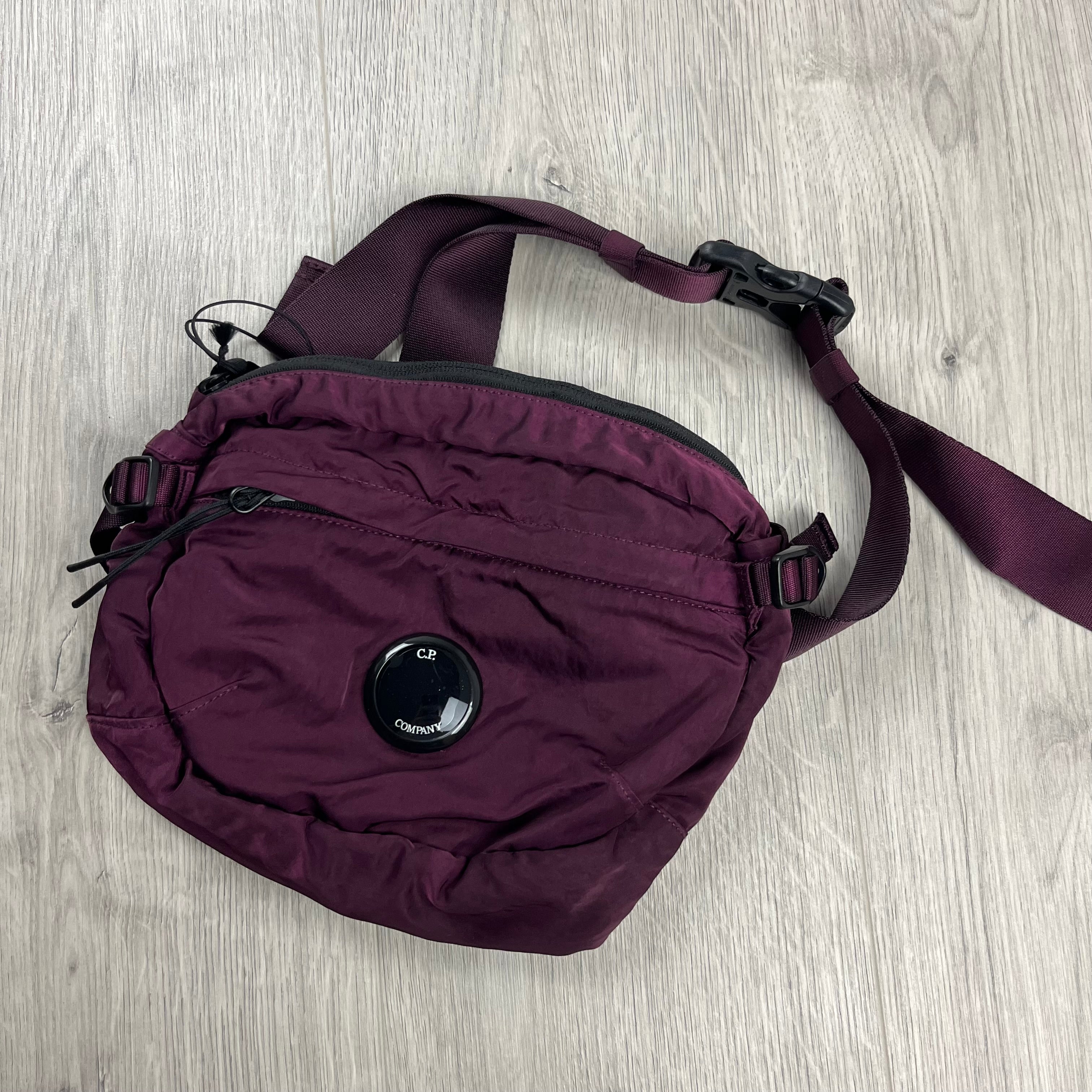 CP Company Nylon B Crossbody Bag in Potent Purple. On sale at Open Attire.