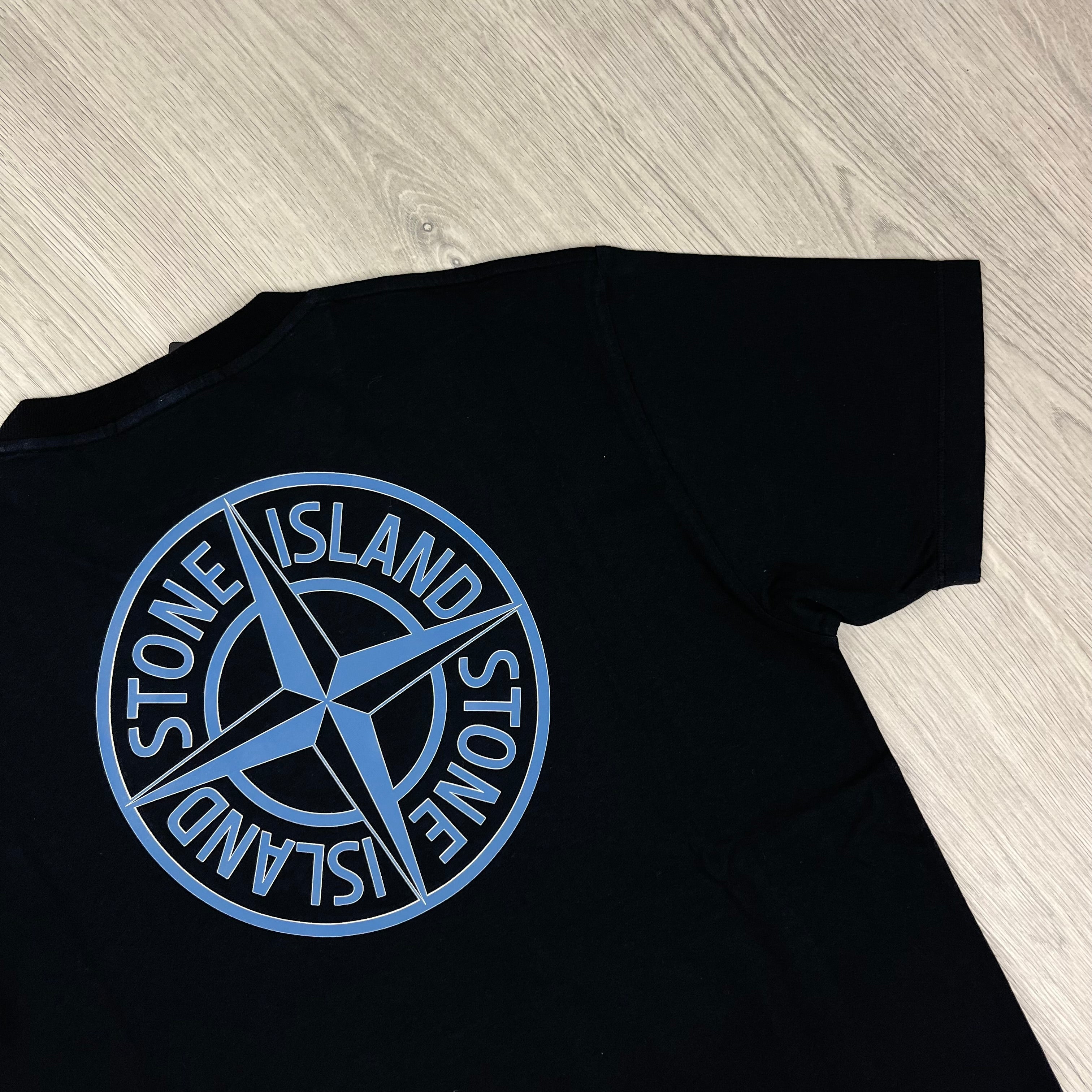 Stone Island 'Institutional Four' T-shirt in Black. On sale at Open Attire.