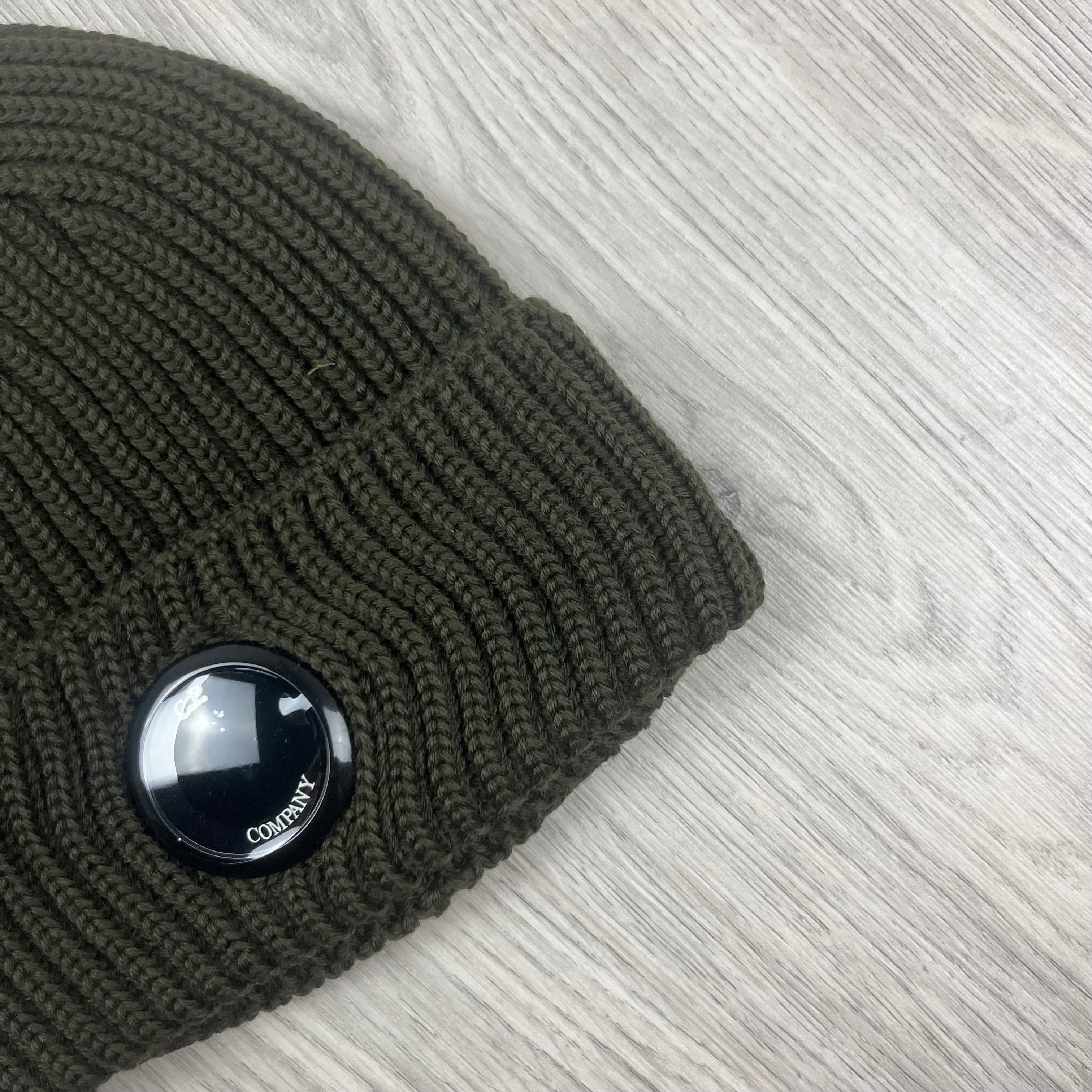 CP Company Merino Wool Lens Beanie in Ivy Green. On sale at Open Attire.