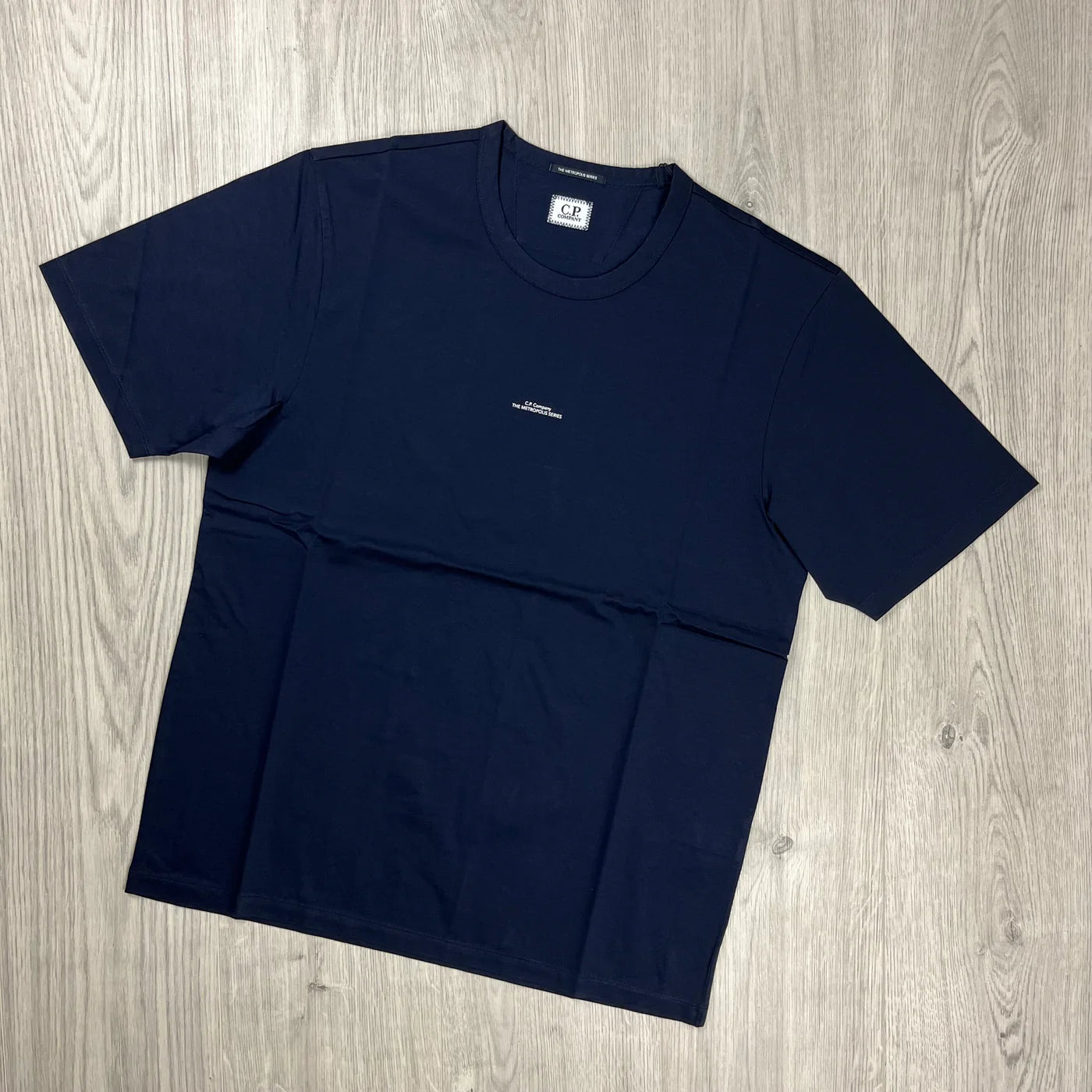 CP Company Metropolis Series T-shirt in a navy blue. On sale at Open Attire.