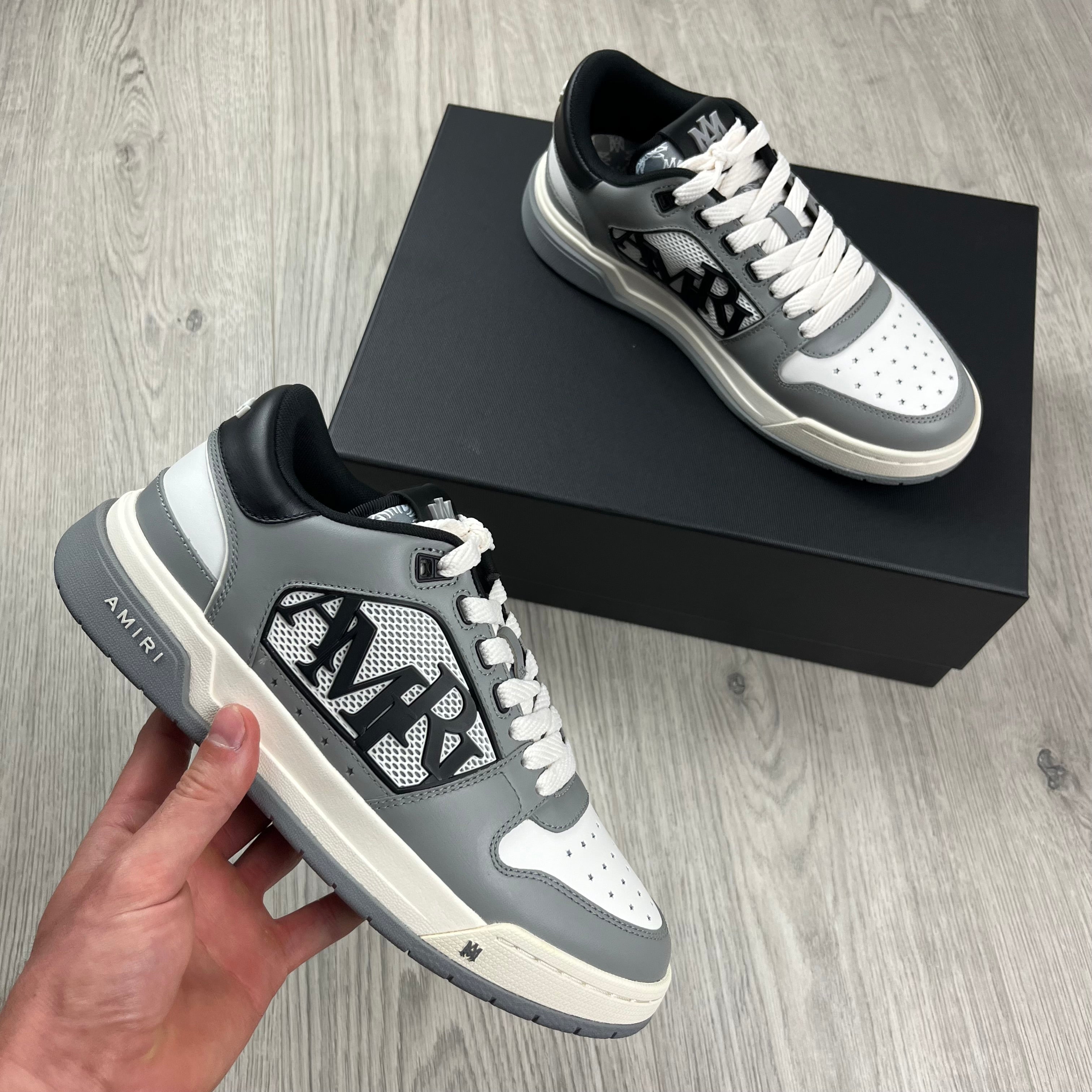 Men's Amiri Classic Low Sneakers in Asphalt Grey. On sale at Open Attire.