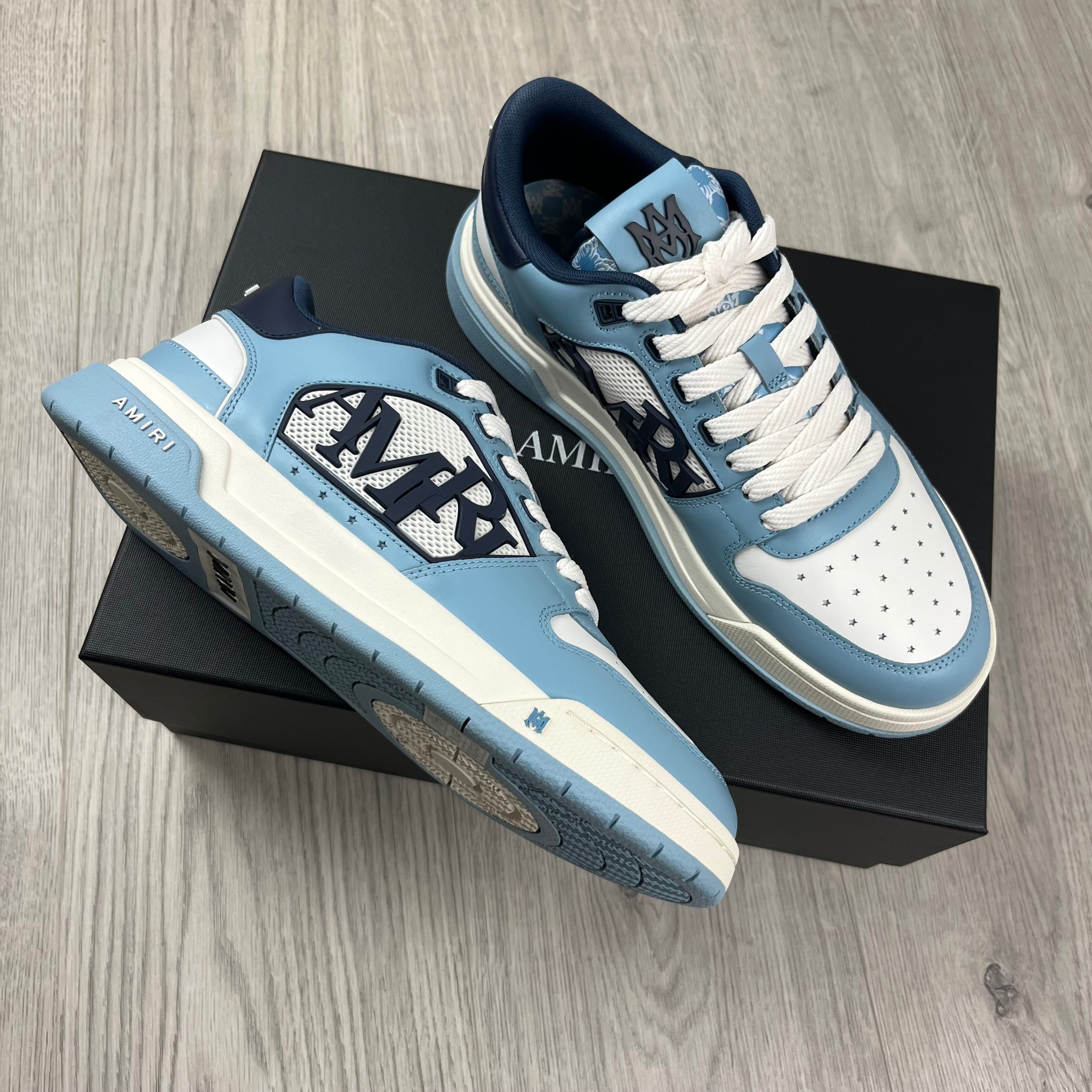 Men's Amiri Classic Low Sneakers in Ocean Sky. On sale at Open Attire.