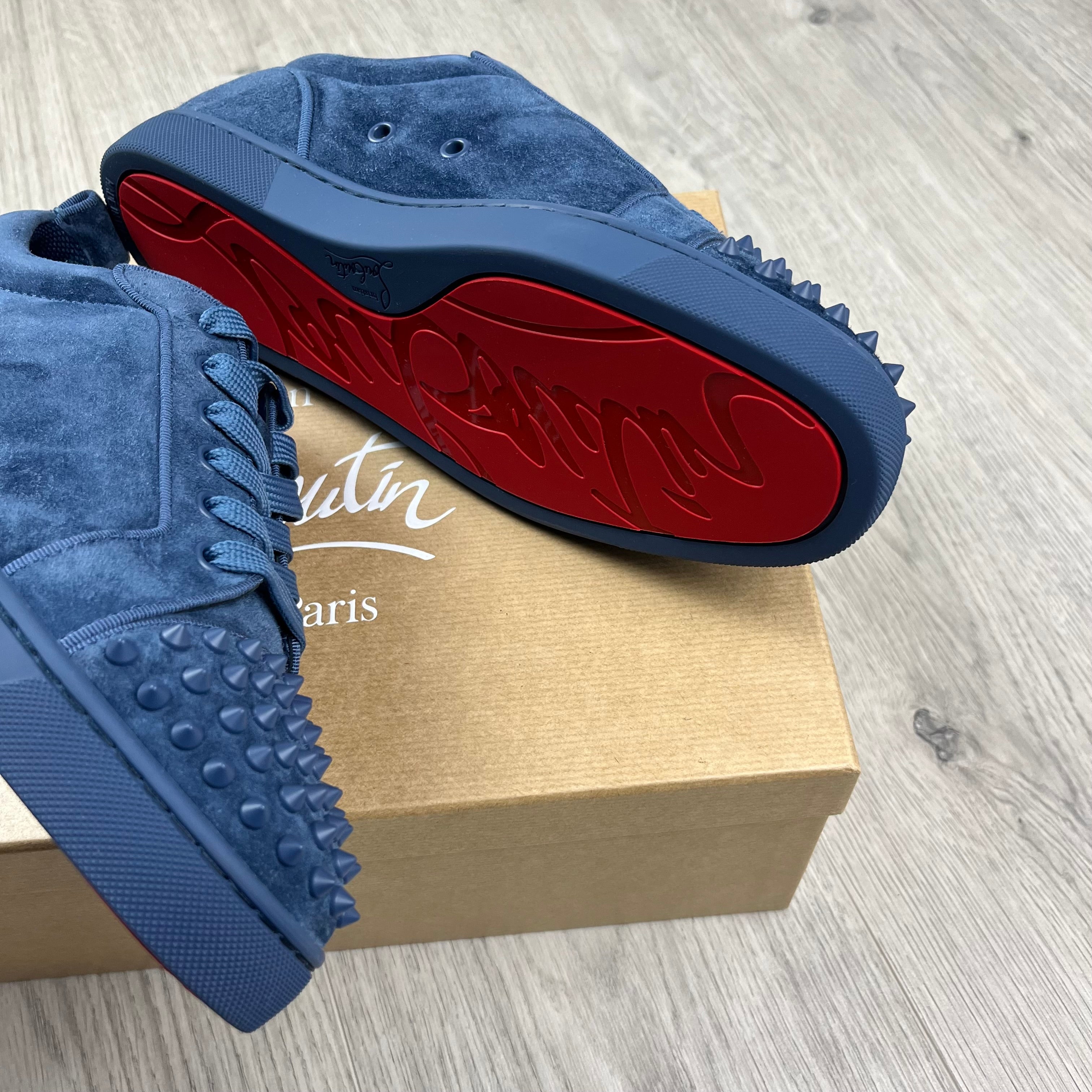 Christian Louboutin Louis Junior Sneakers in Denim Blue. On sale at Open Attire.