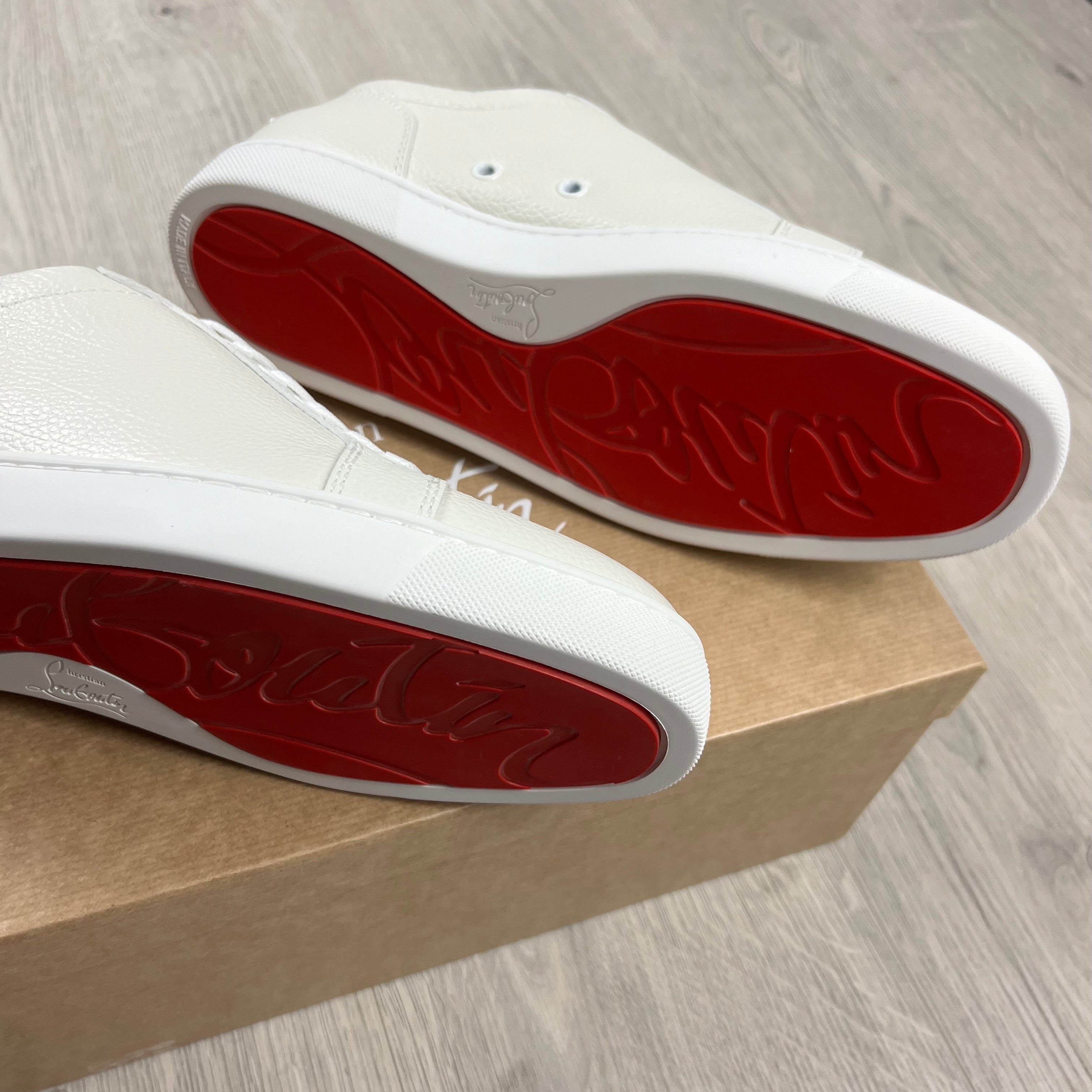 Christian Louboutin Rantulow Sneakers in White. On sale at Open Attire.