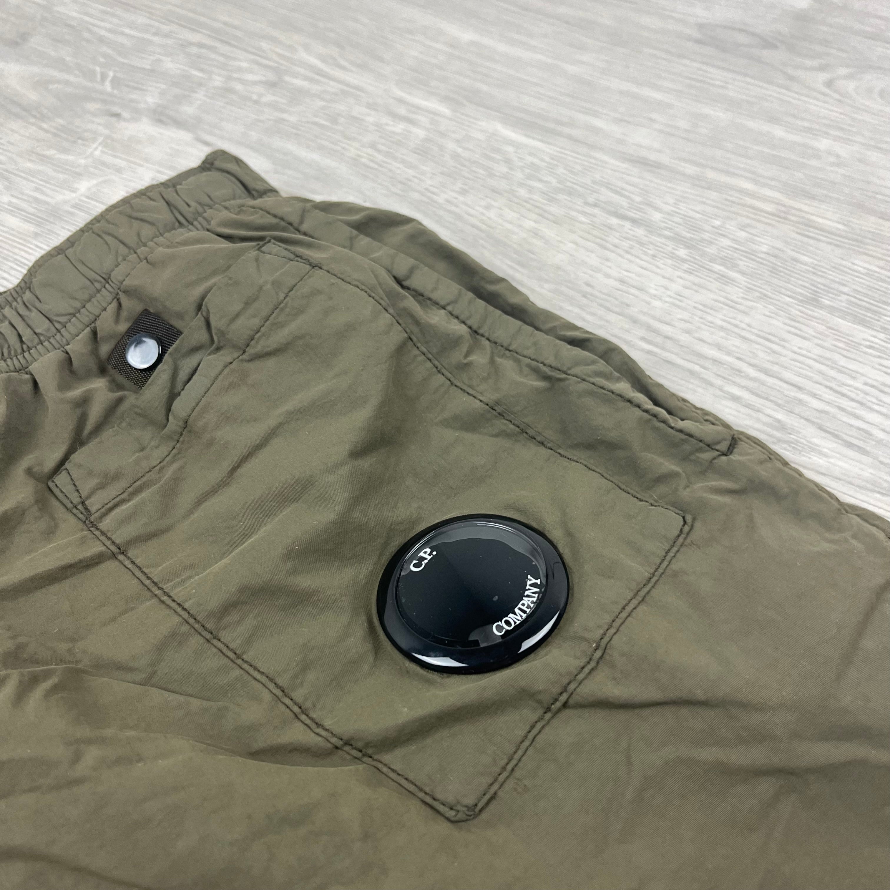 CP Company Flatt Nylon Swim Shorts in Ivy Green. On sale at Open Attire.