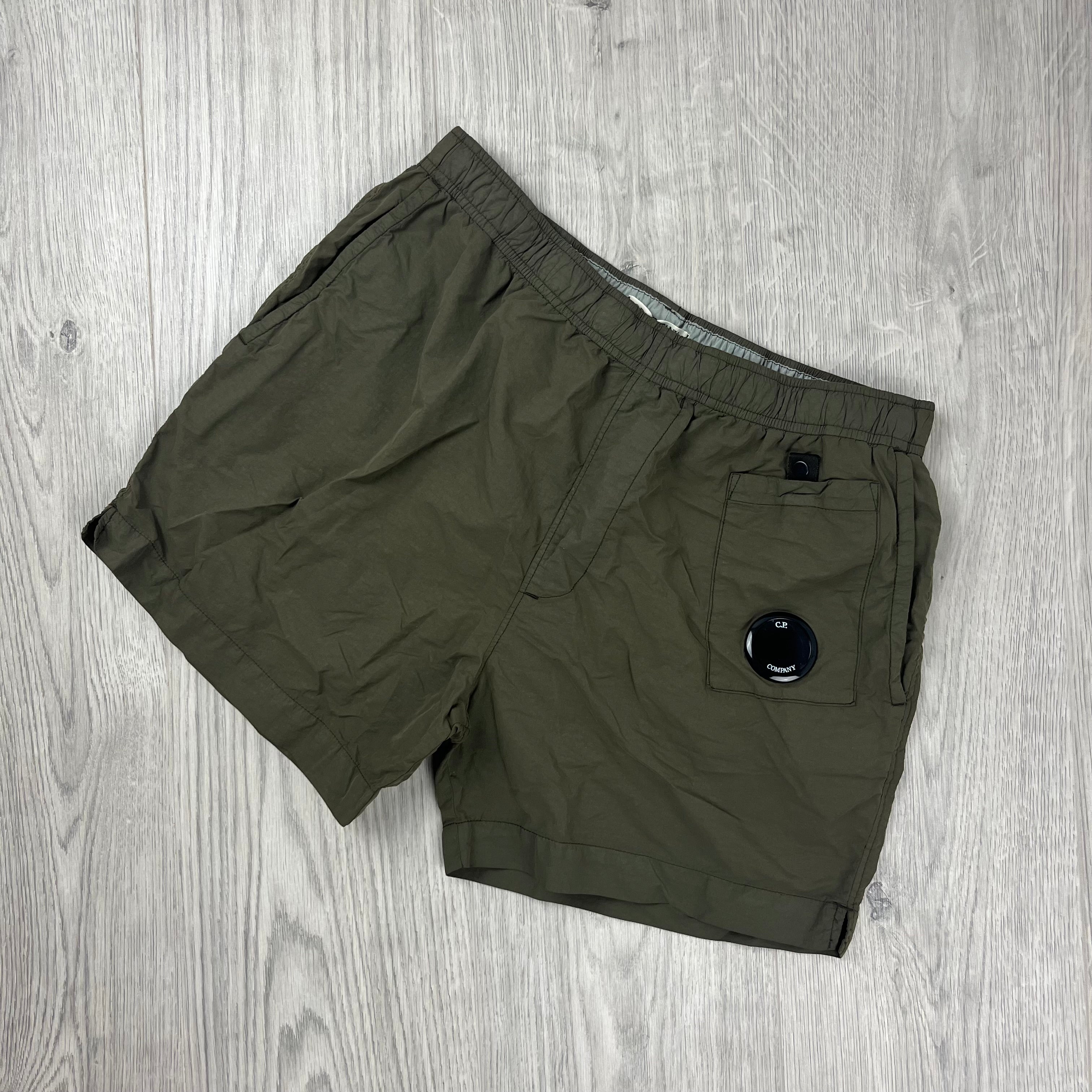 CP Company Flatt Nylon Swim Shorts in Ivy Green. On sale at Open Attire.