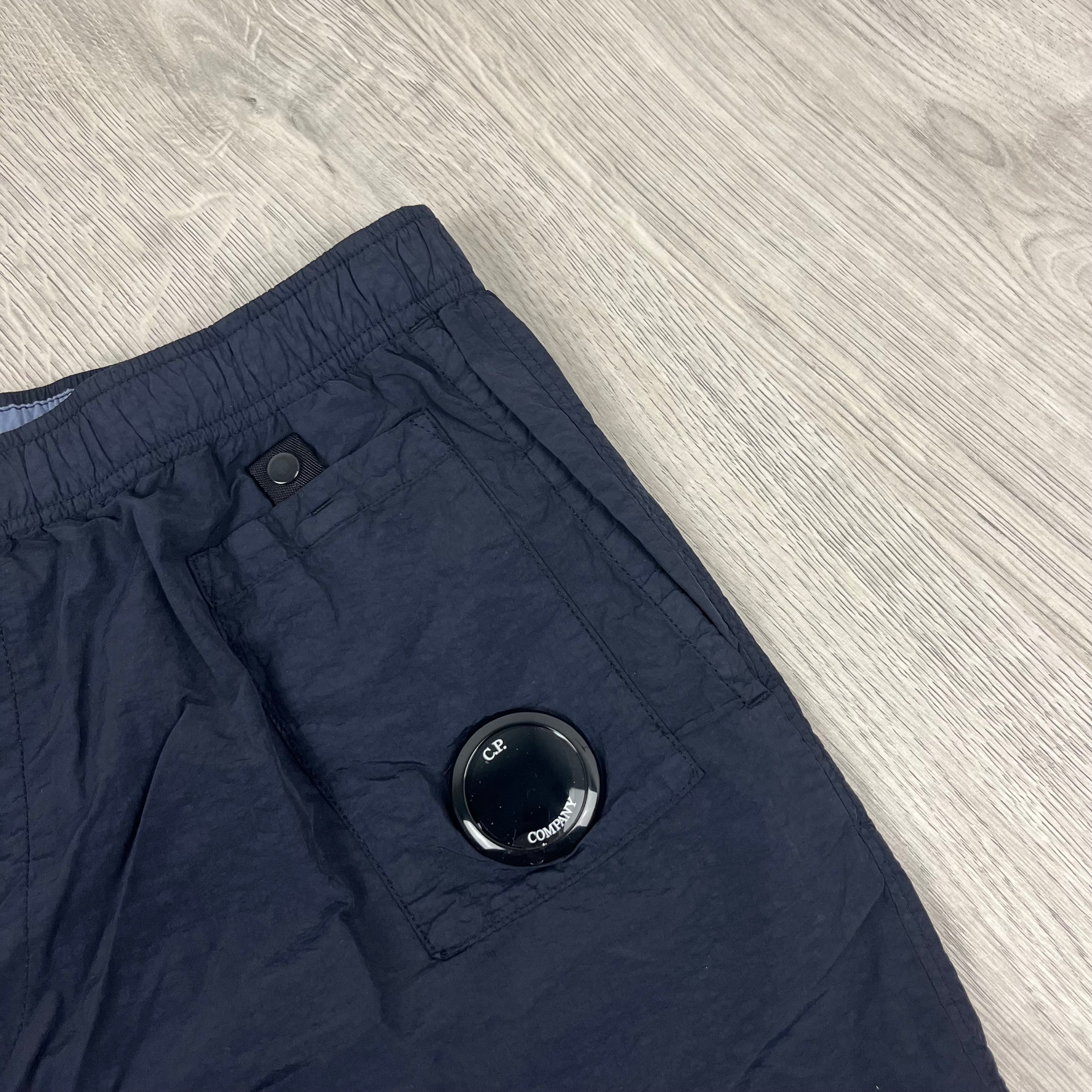 Men's CP Company Flatt Nylon Swim Shorts in Total Eclipse. On sale at Open Attire.