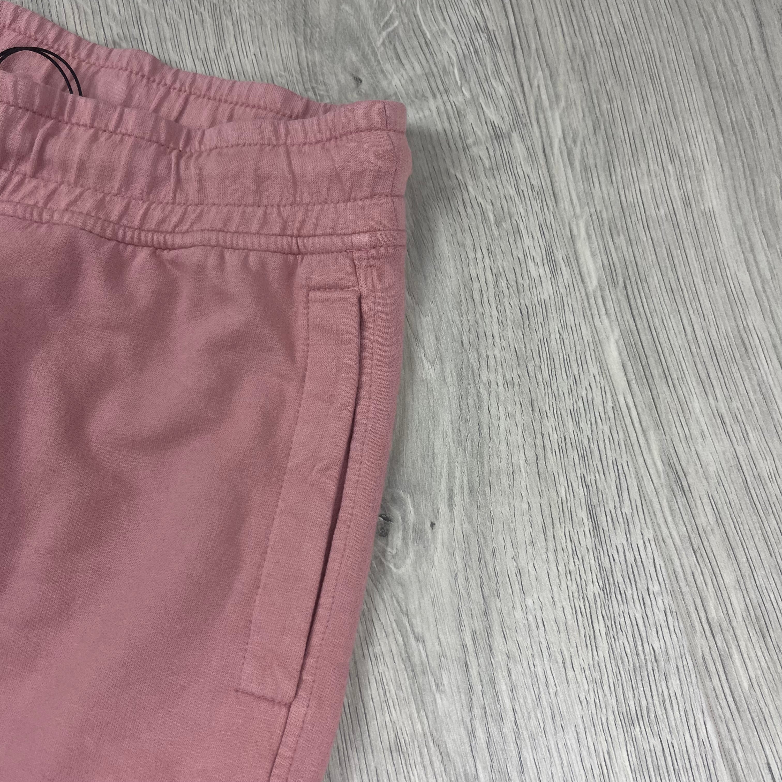 CP Company Light Fleece Jersey Shorts in Pale Mauve. On sale at Open Attire.