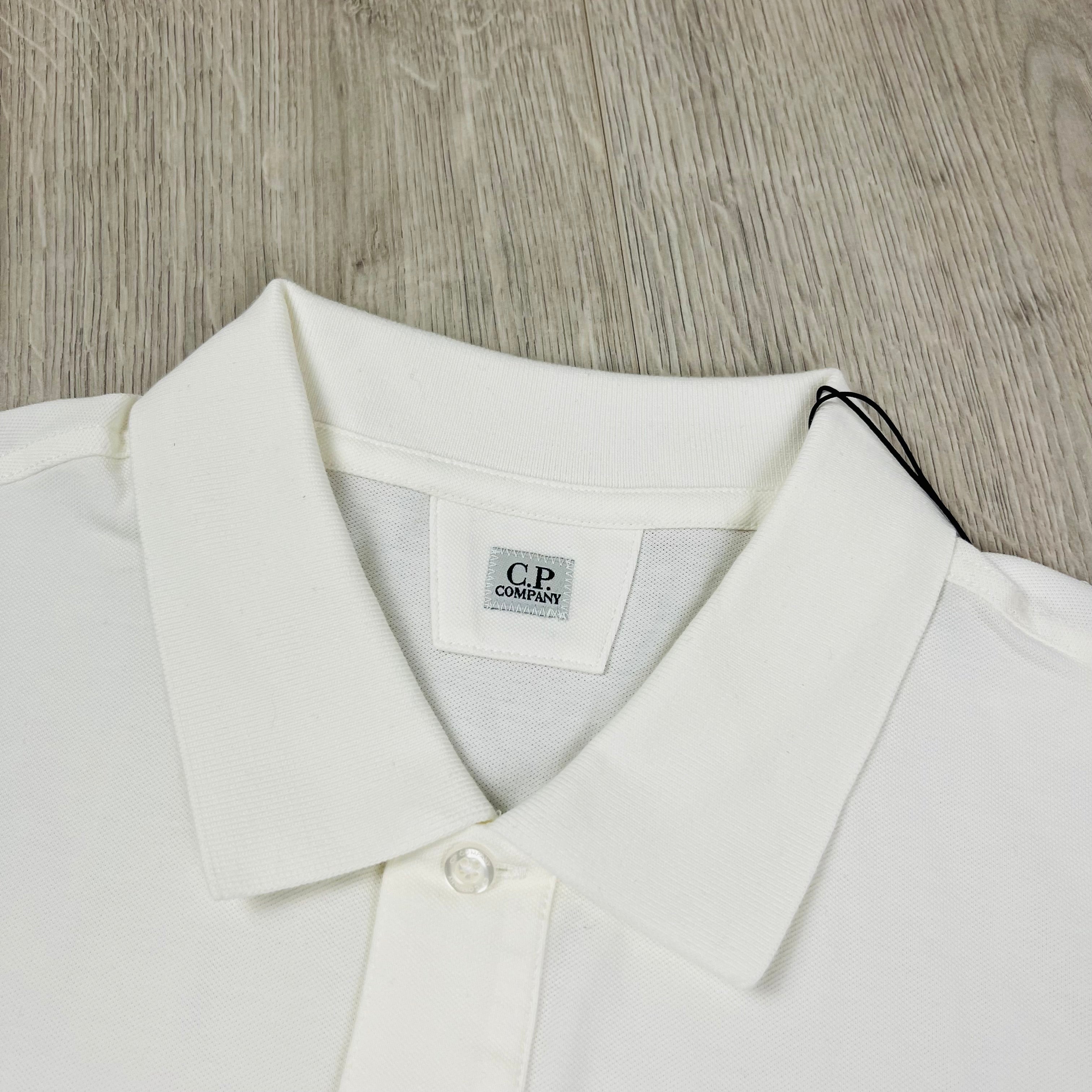 CP Company Polo Shirt in White. On sale at Open Attire.