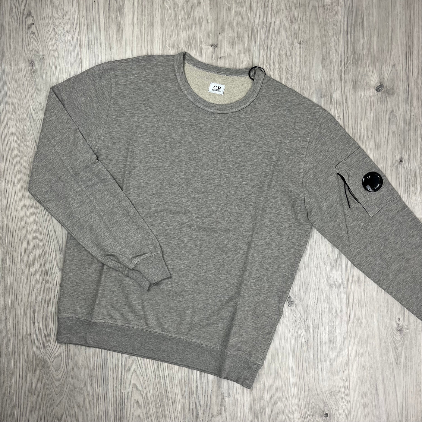 CP Company Light Fleece Tracksuit in Greystone Melange. On sale at Open Attire.