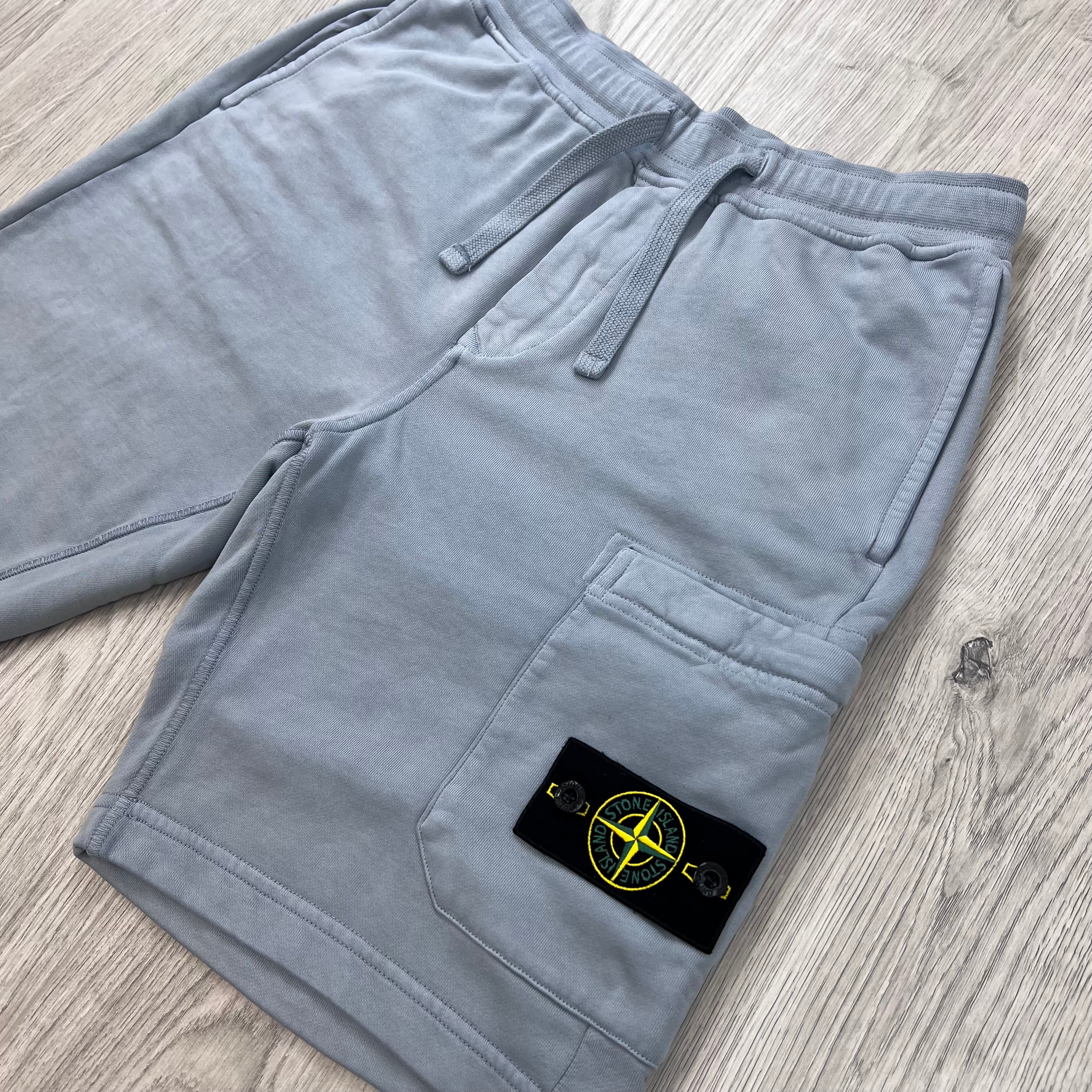 Angled view of the Stone Island Jersey Shorts in Ash Grey. 