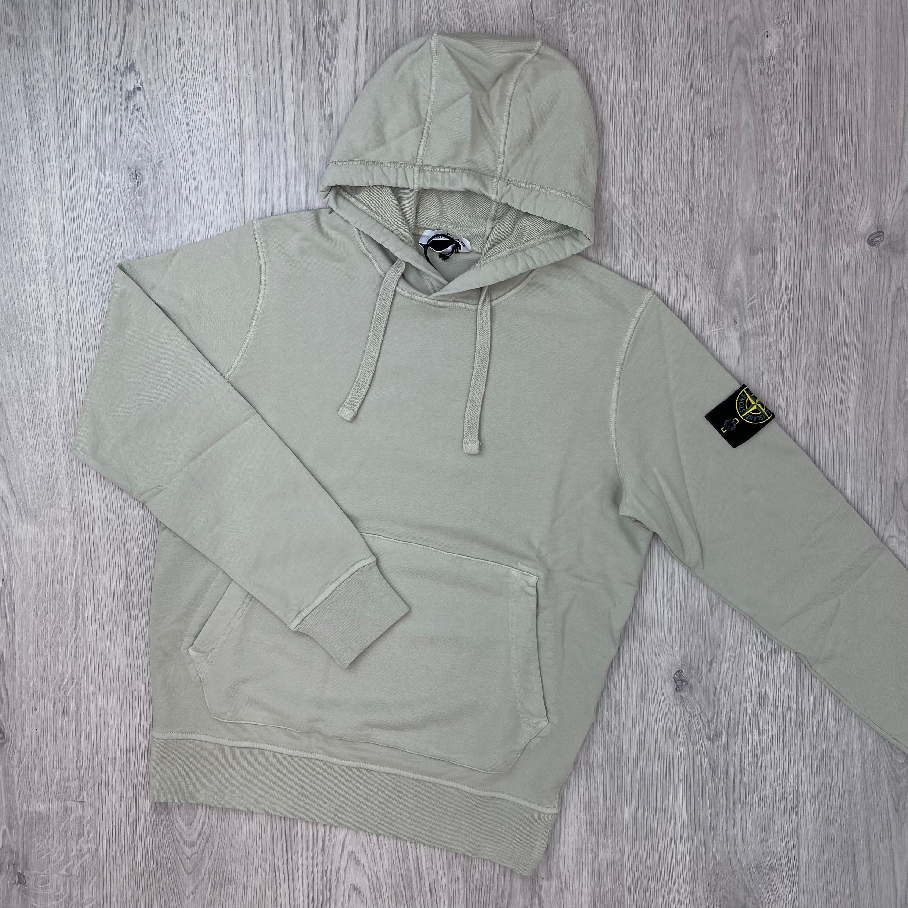 Front view of a Stone Island Pullover Hoodie in Sand. 
