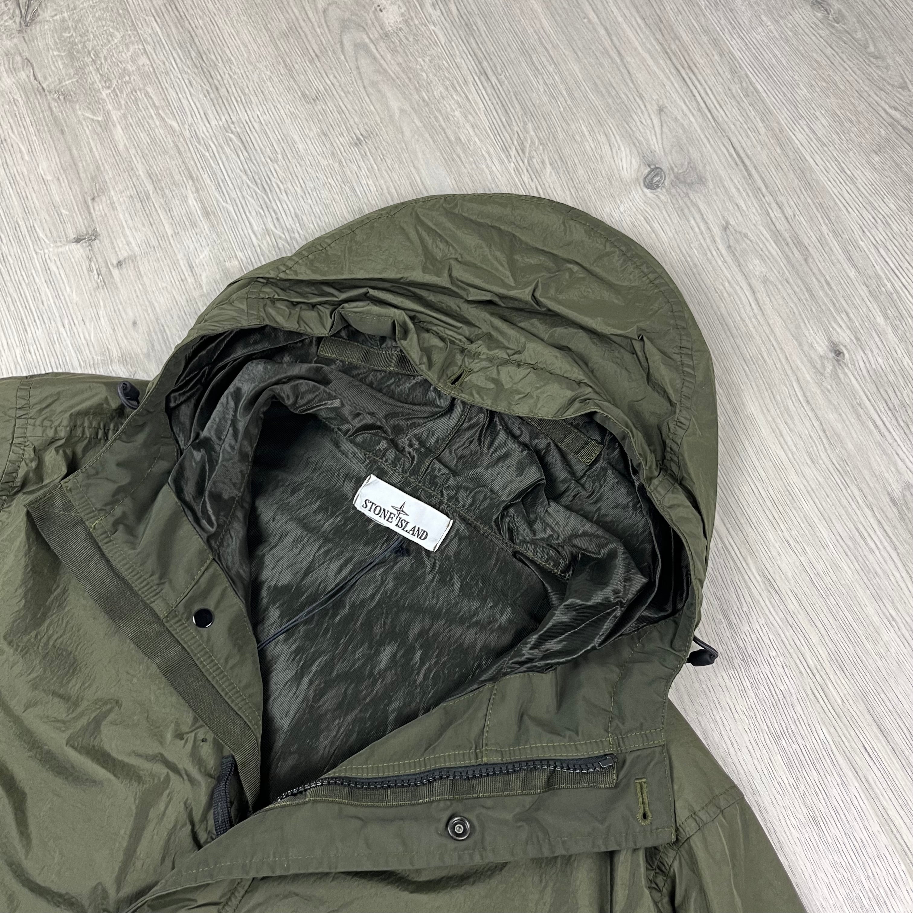 Stone Island Crinkle Reps R-NY Jacket in Military Green. On sale at Open Attire.