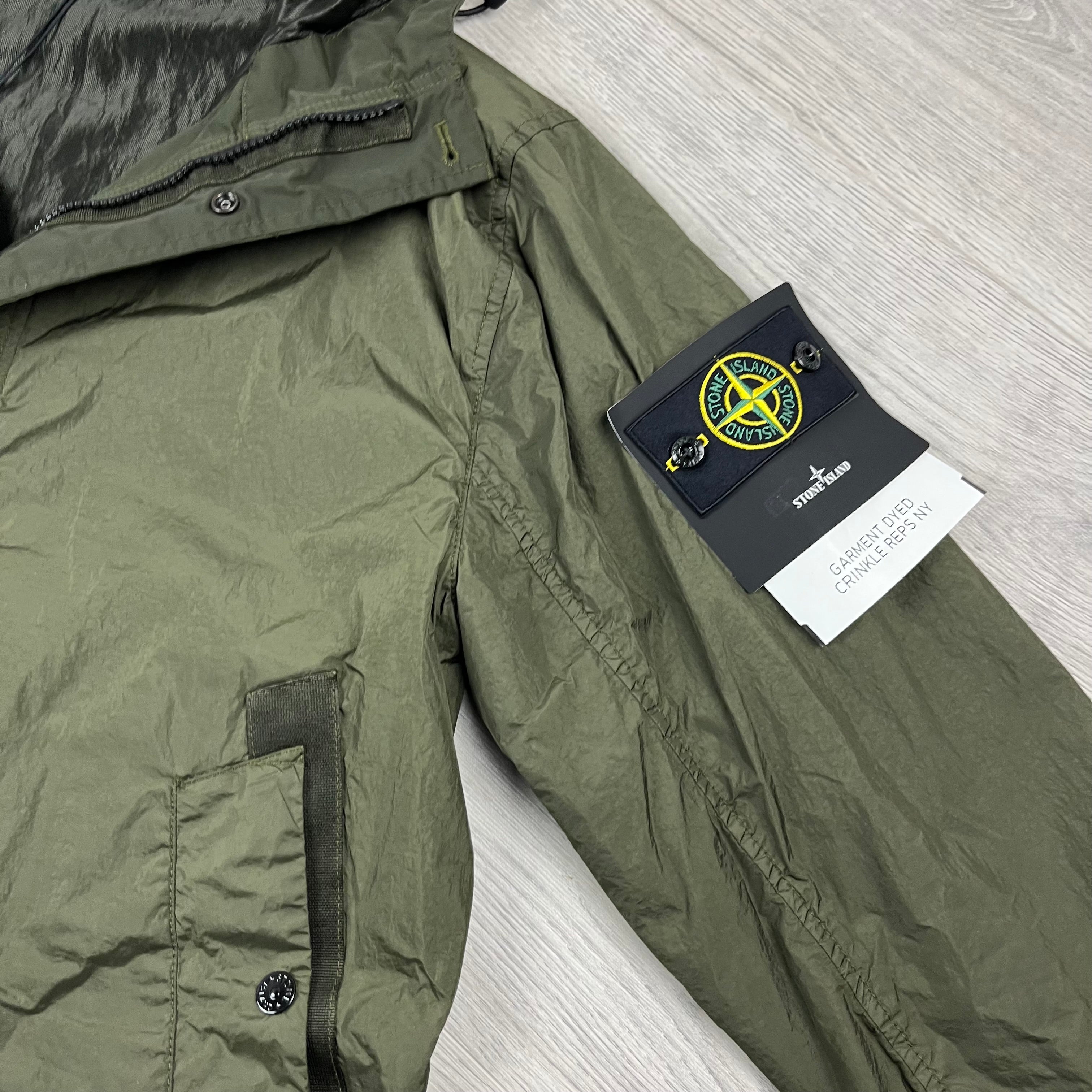 Stone Island Crinkle Reps R-NY Jacket in Military Green. On sale at Open Attire.