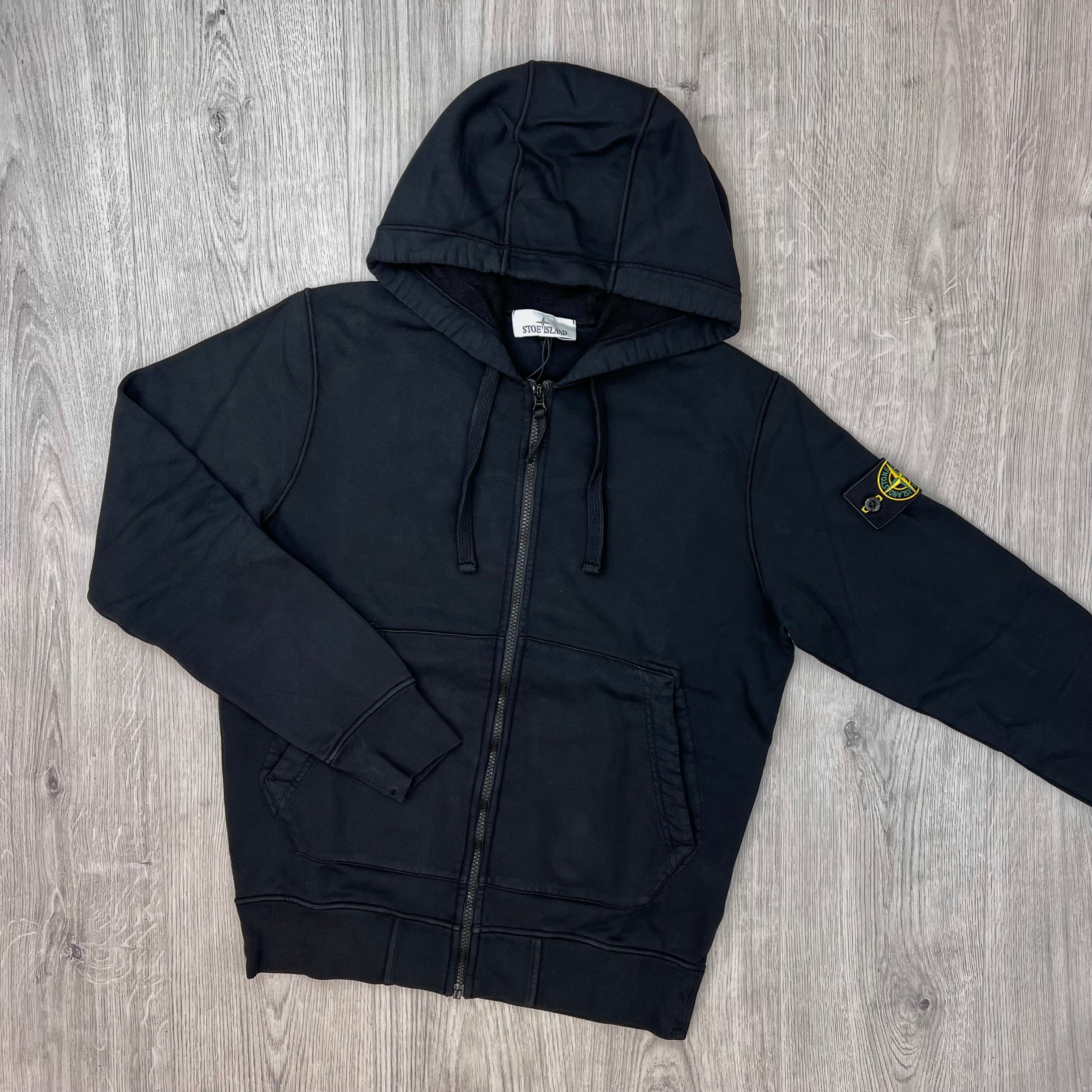 Front view of the Stone Island Zip Hoodie in Black. 
