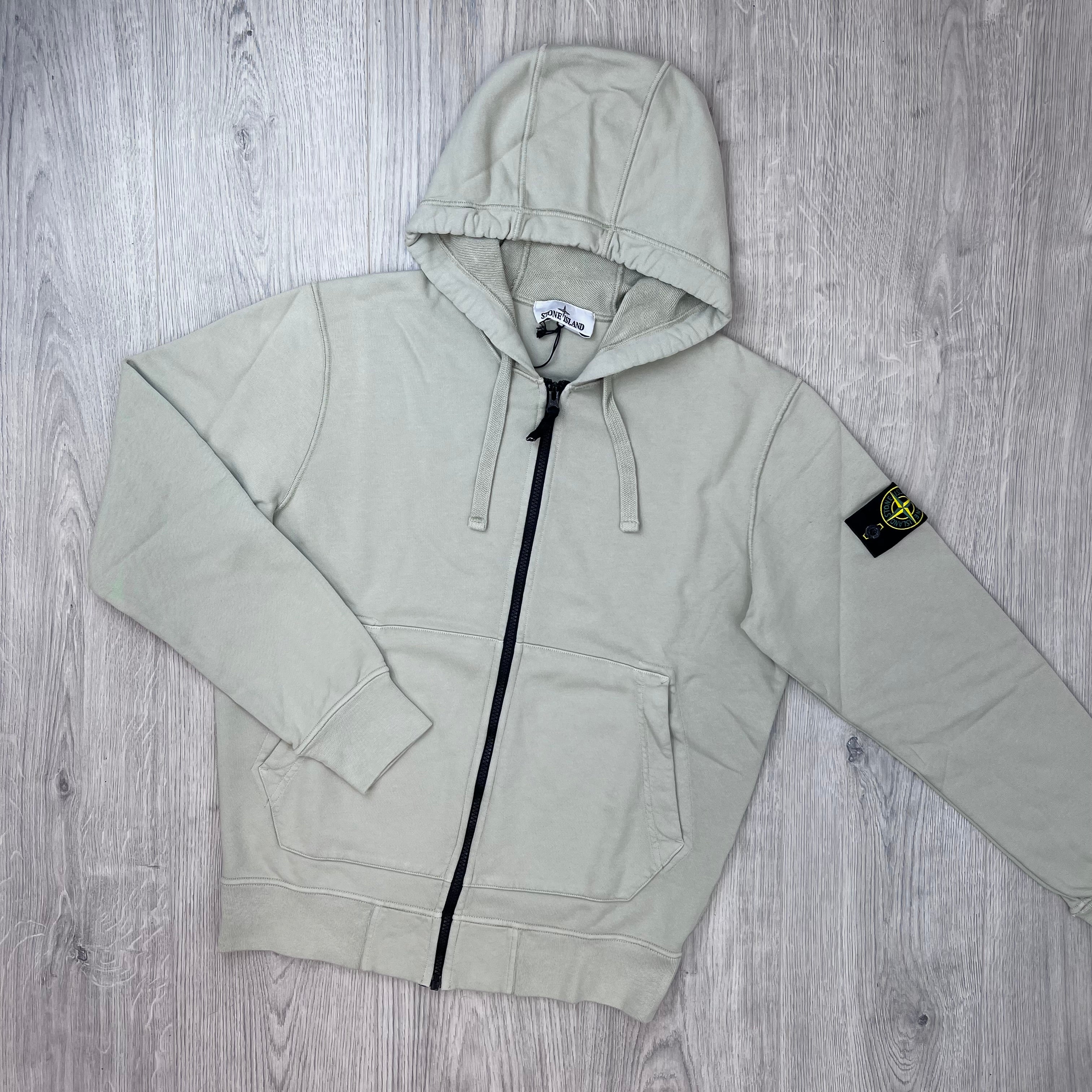 Front view of the Stone Island Zip Hoodie in Sand. 